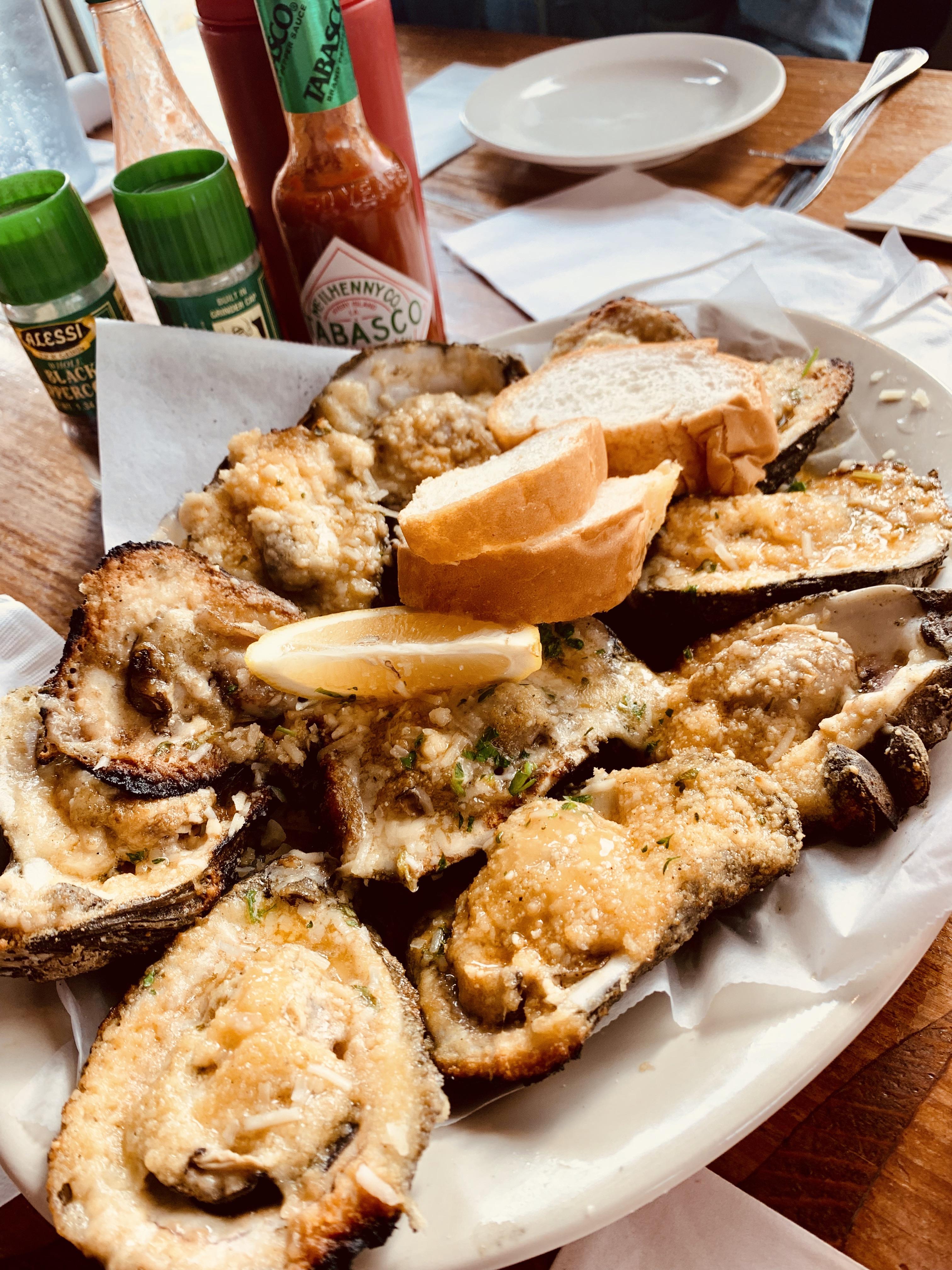 Charbroiled oysters on Lake Pontchartrain r/FoodPorn