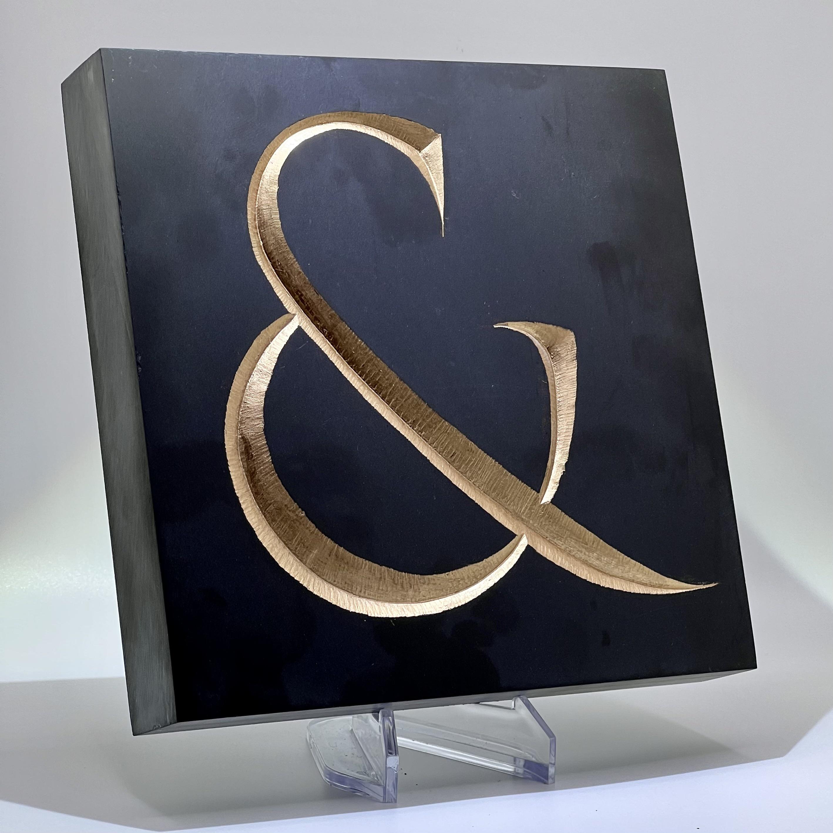 Gold ampersand in slate, hand carved with hammer and chisel r/handmade