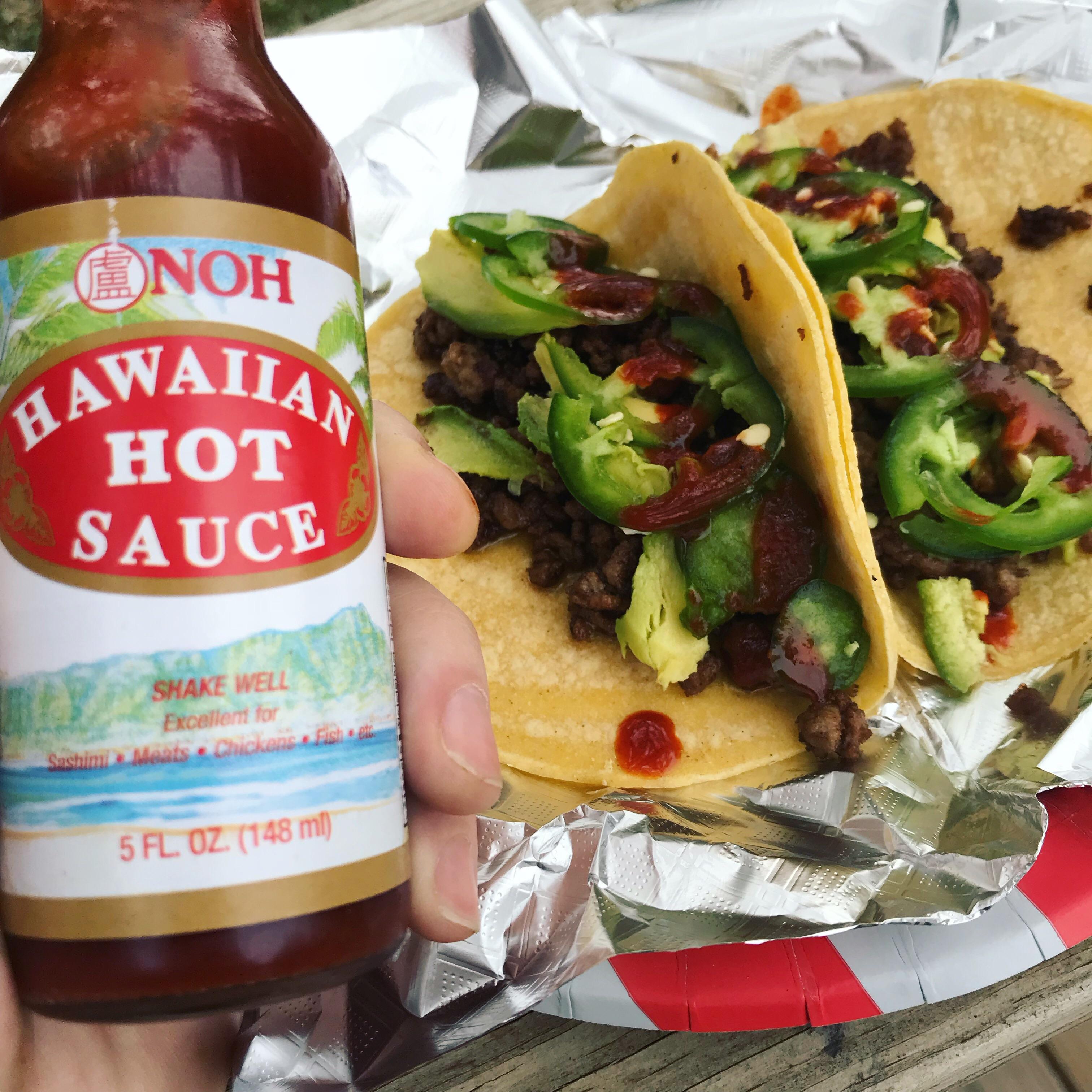 Happy hour tacos of lamb and avocado with fresh jalapeños and some Noh