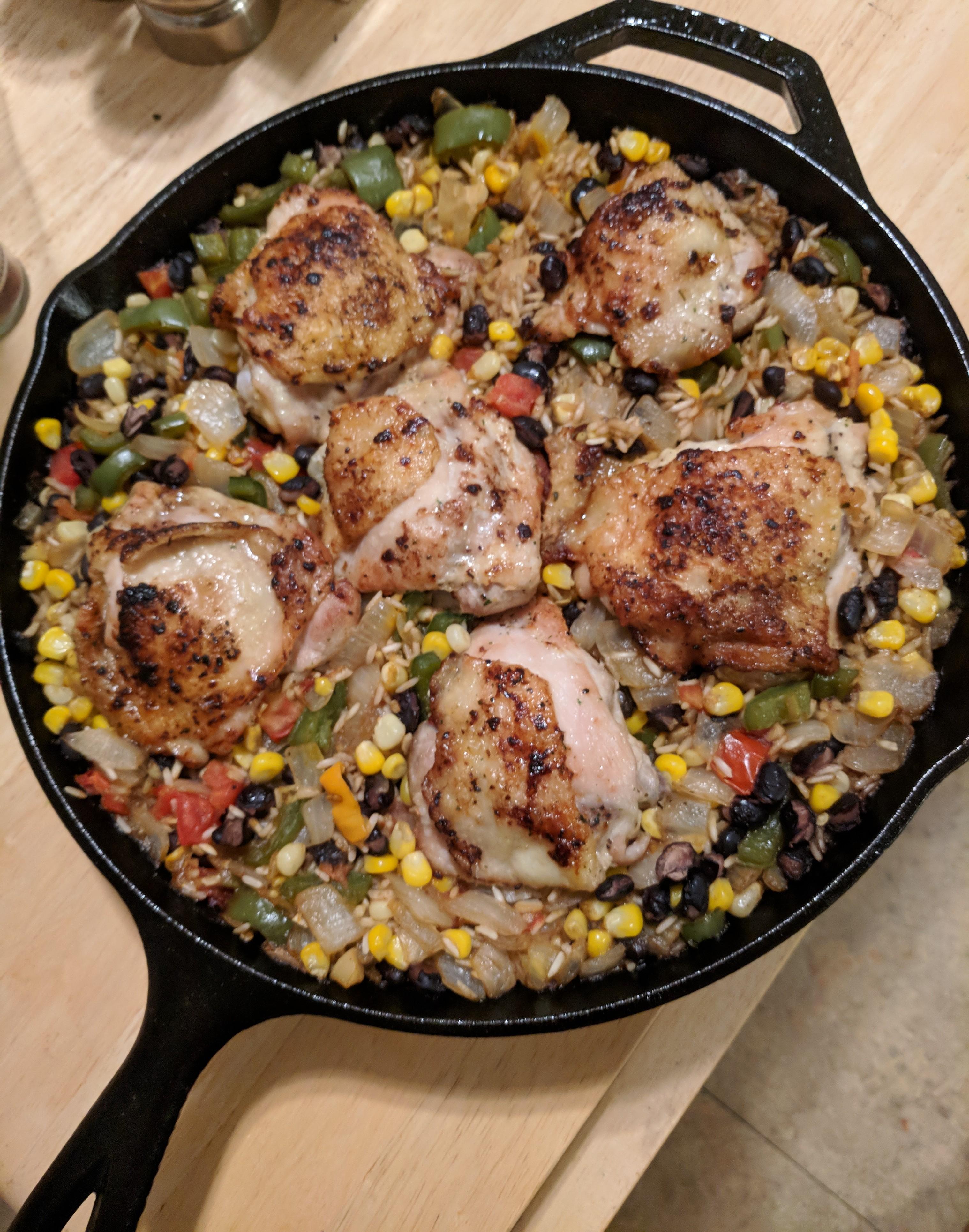Chicken thighs with black beans and rice r/castiron