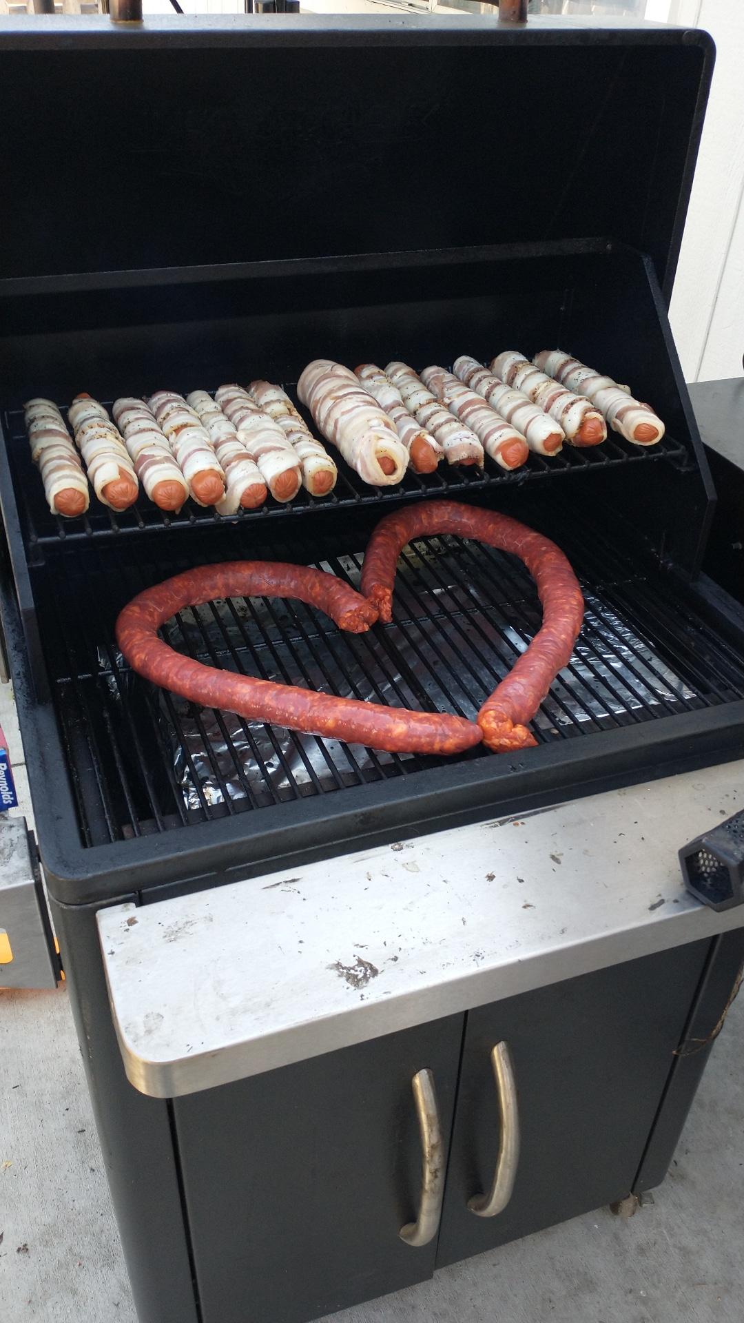 Cooked bacon wrapped hotdogs and chorizo for 4th of July! The Traeger