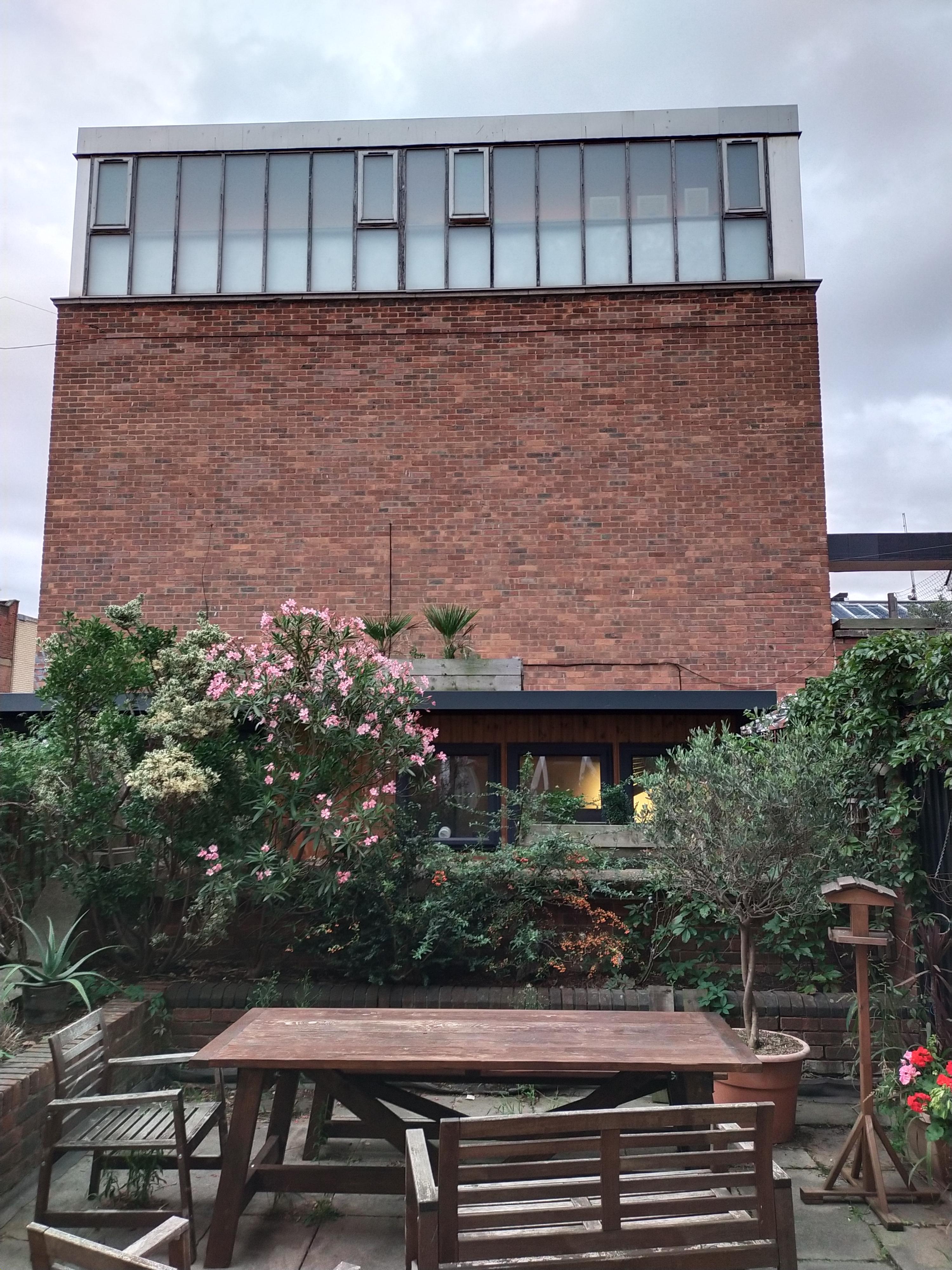 Ideas on climbers to cover a brick wall. r/gardening