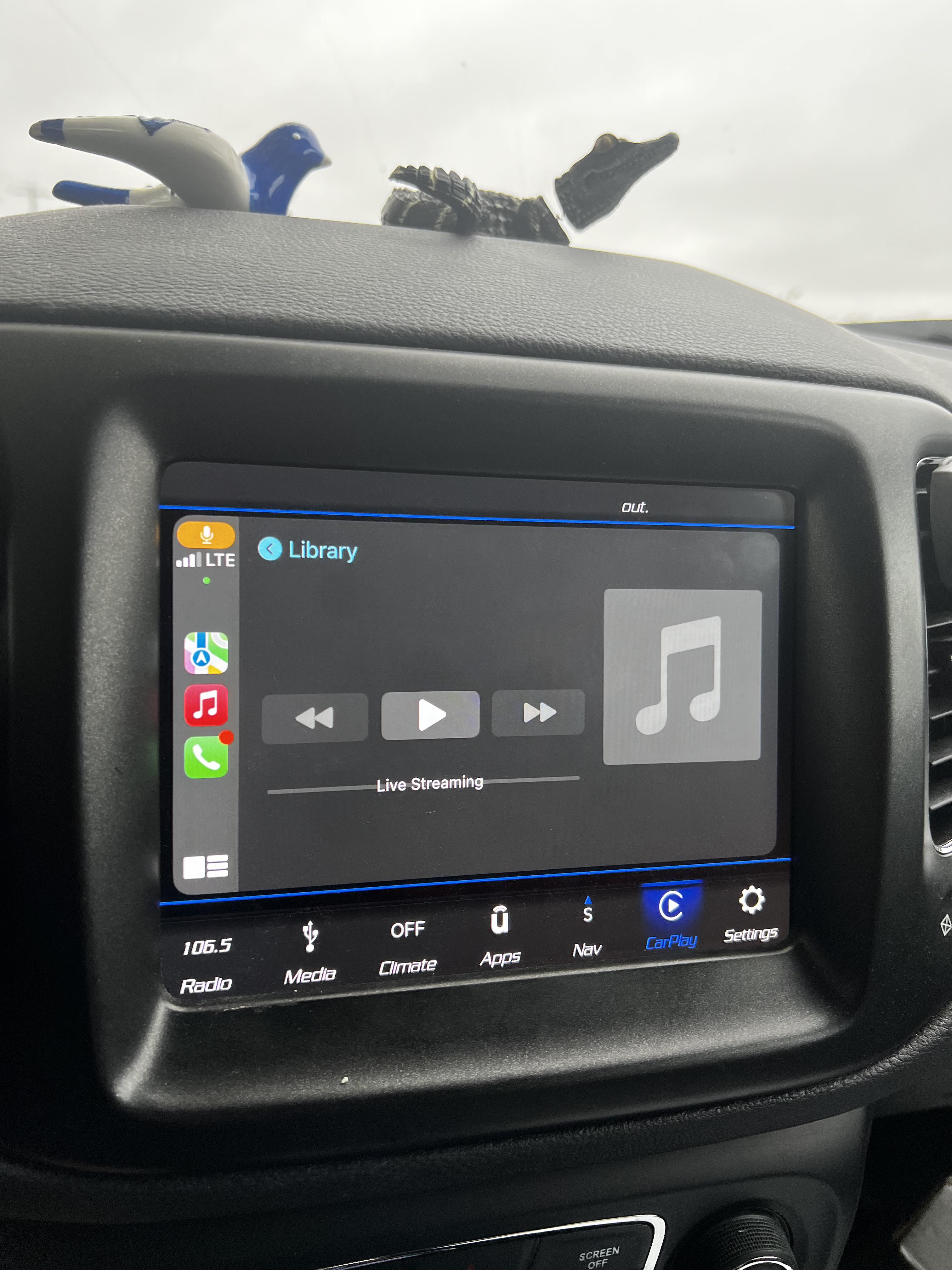 My car play is stuck on this screen when trying to play music. Over