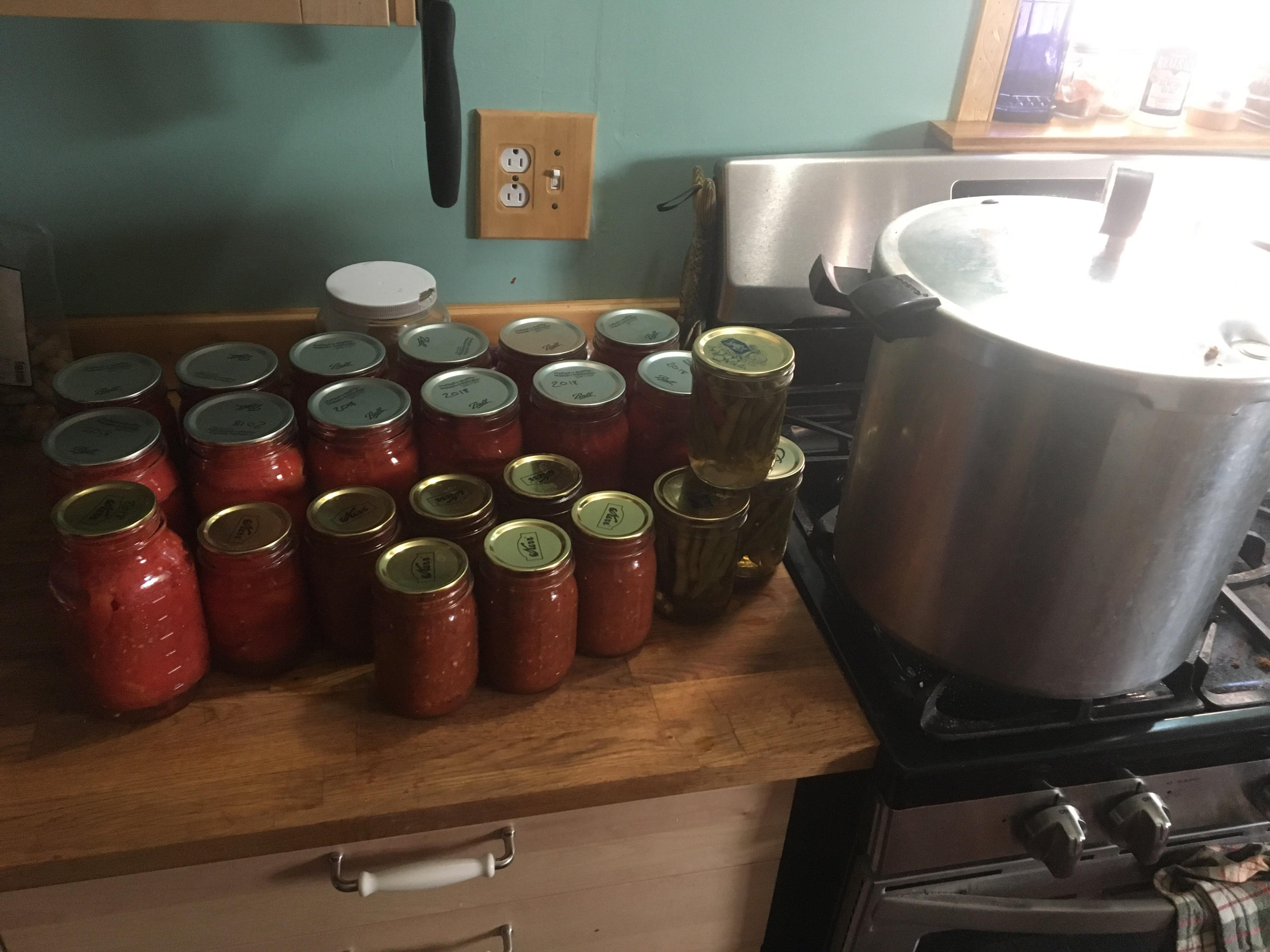 Lots of tomatoes to process. 20.5 quarts of whole tomatoes(7 are still