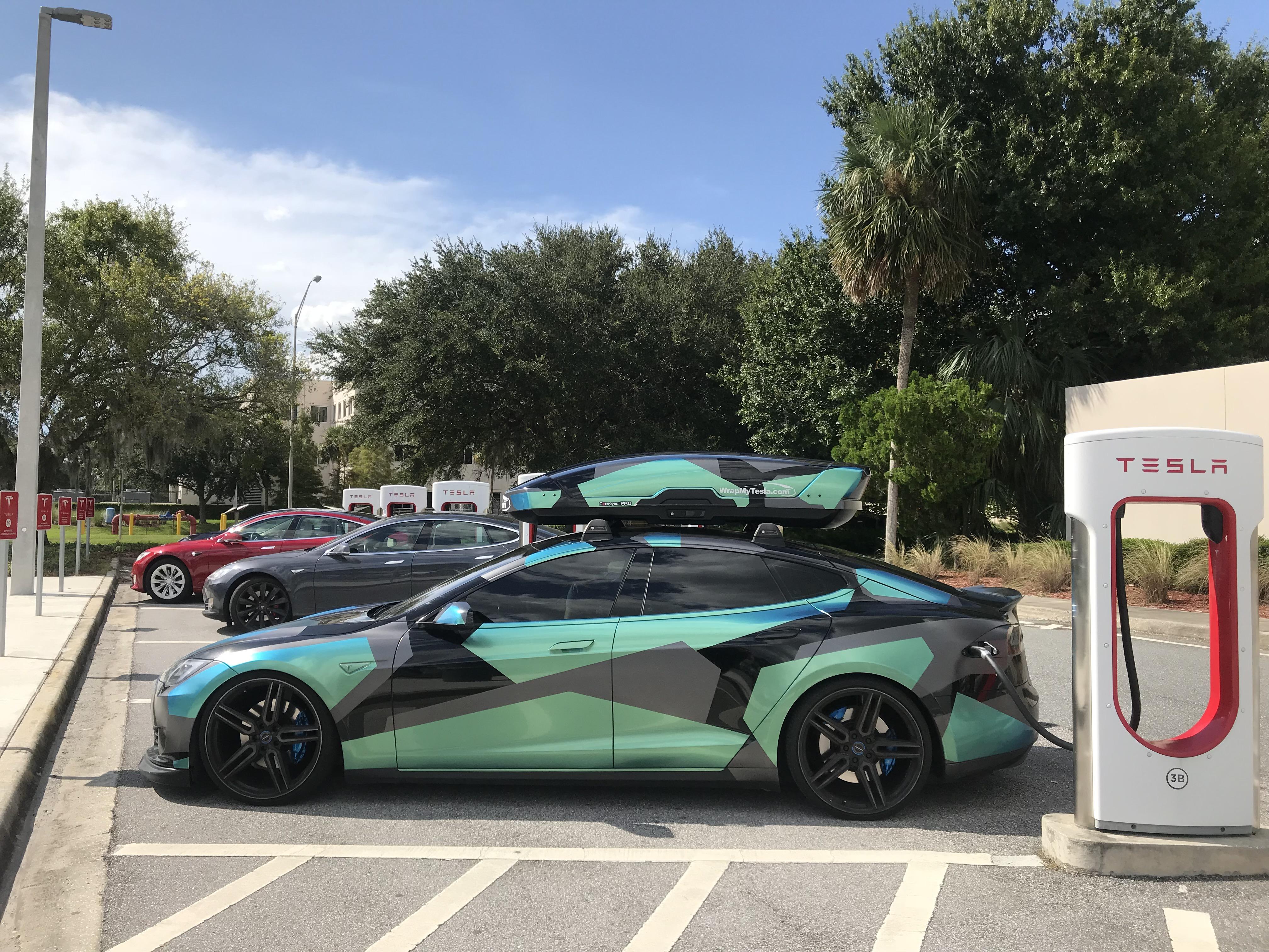 The wrap is Satin Dark Gray and Aqua Marine Flip over our black paint