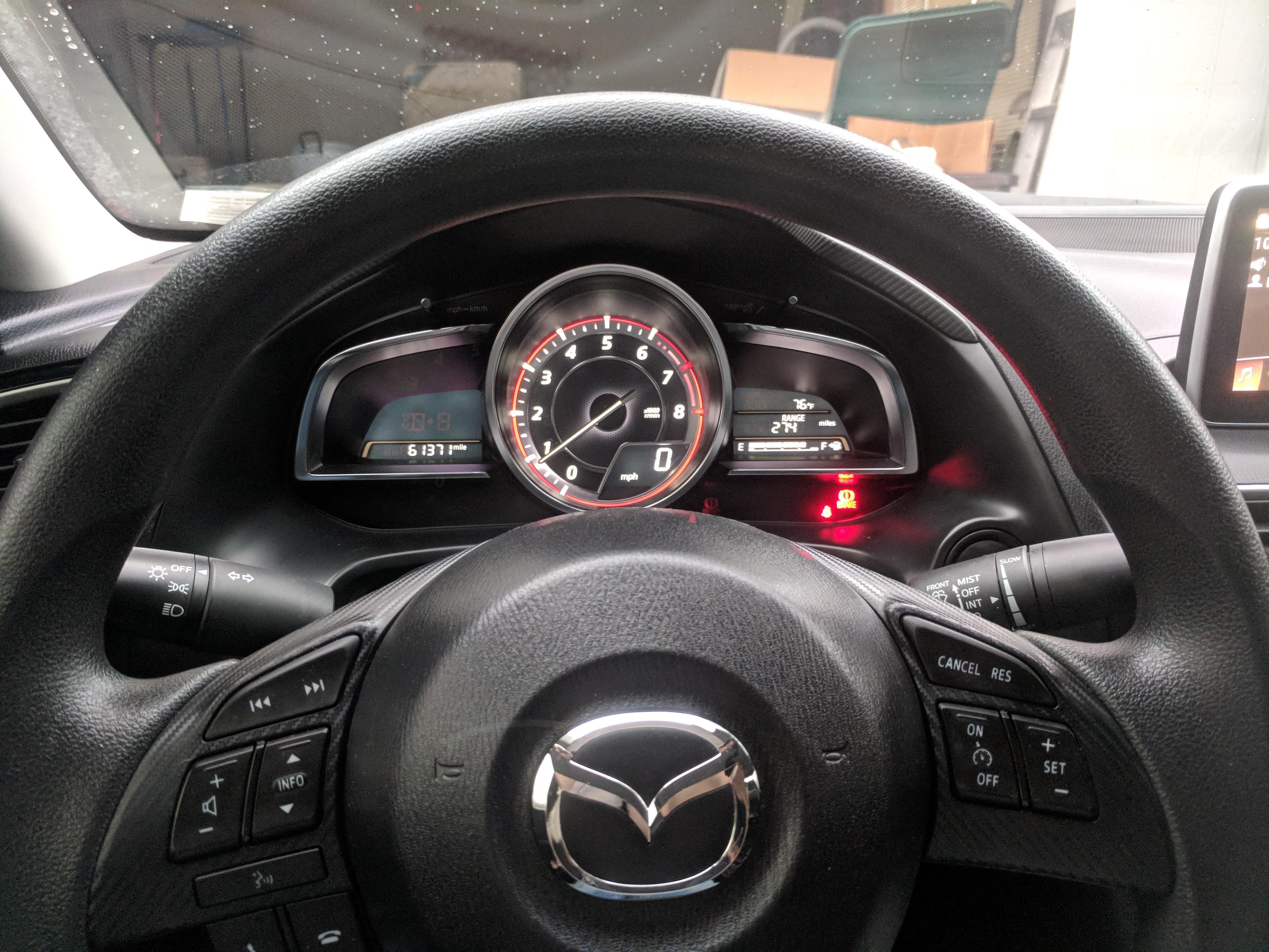 Swapped a GT gauge cluster into my Sport r/mazda3