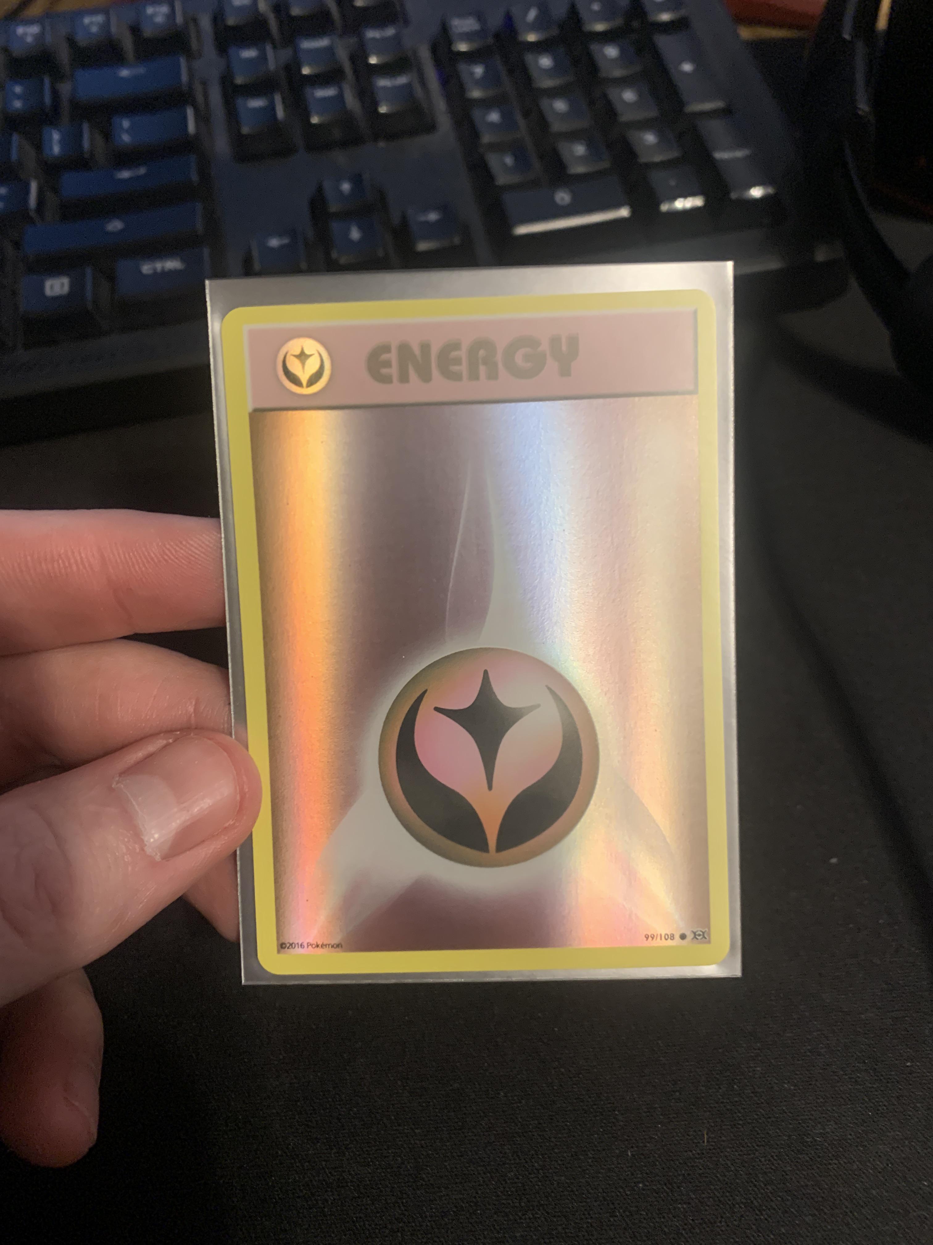 Reverse holo fairy energy error. Any info on the discoloration? r/PokemonTCG