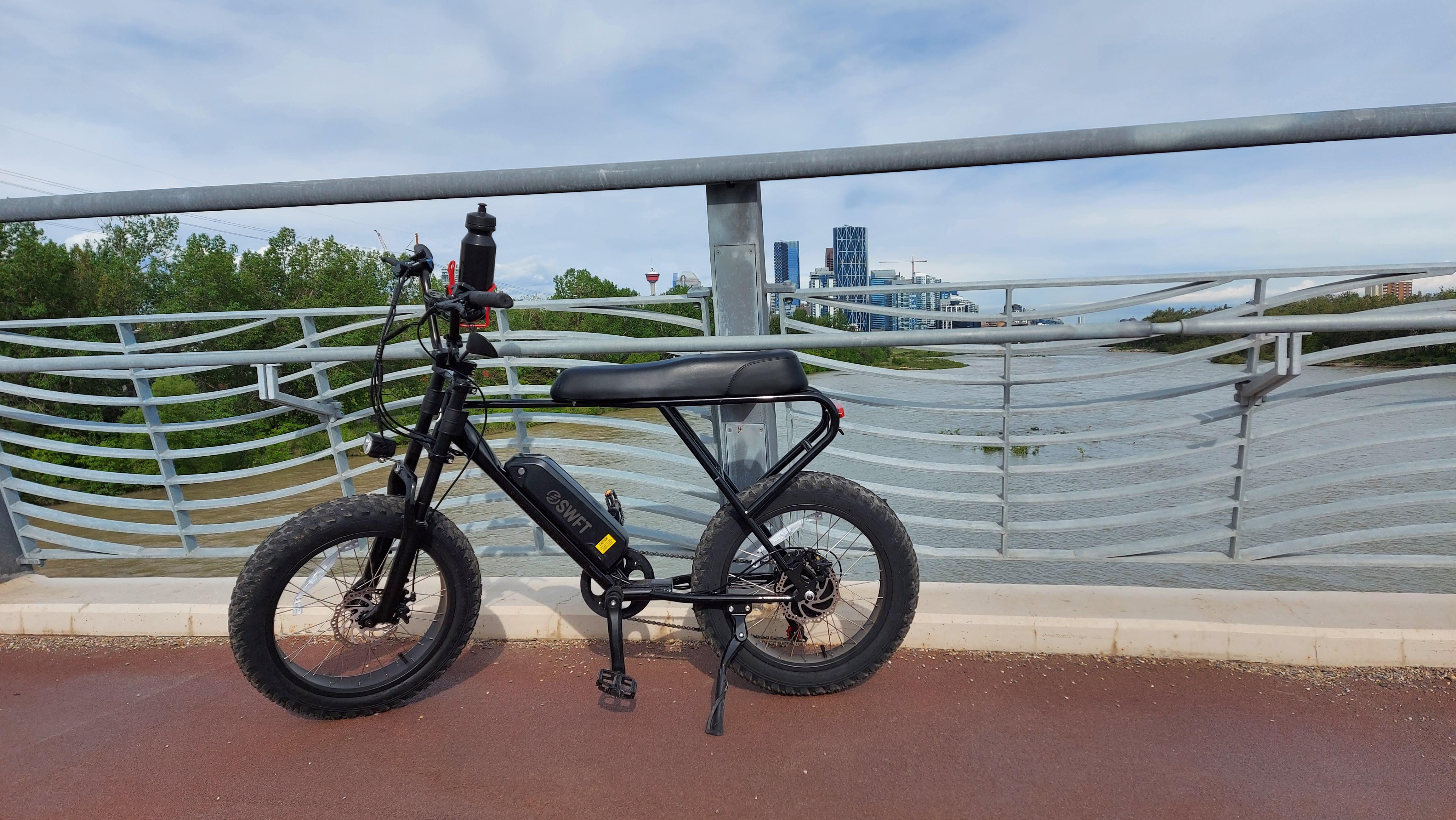 New Swft Zip ebike. Bridge pic with Calgary Downtown in the background