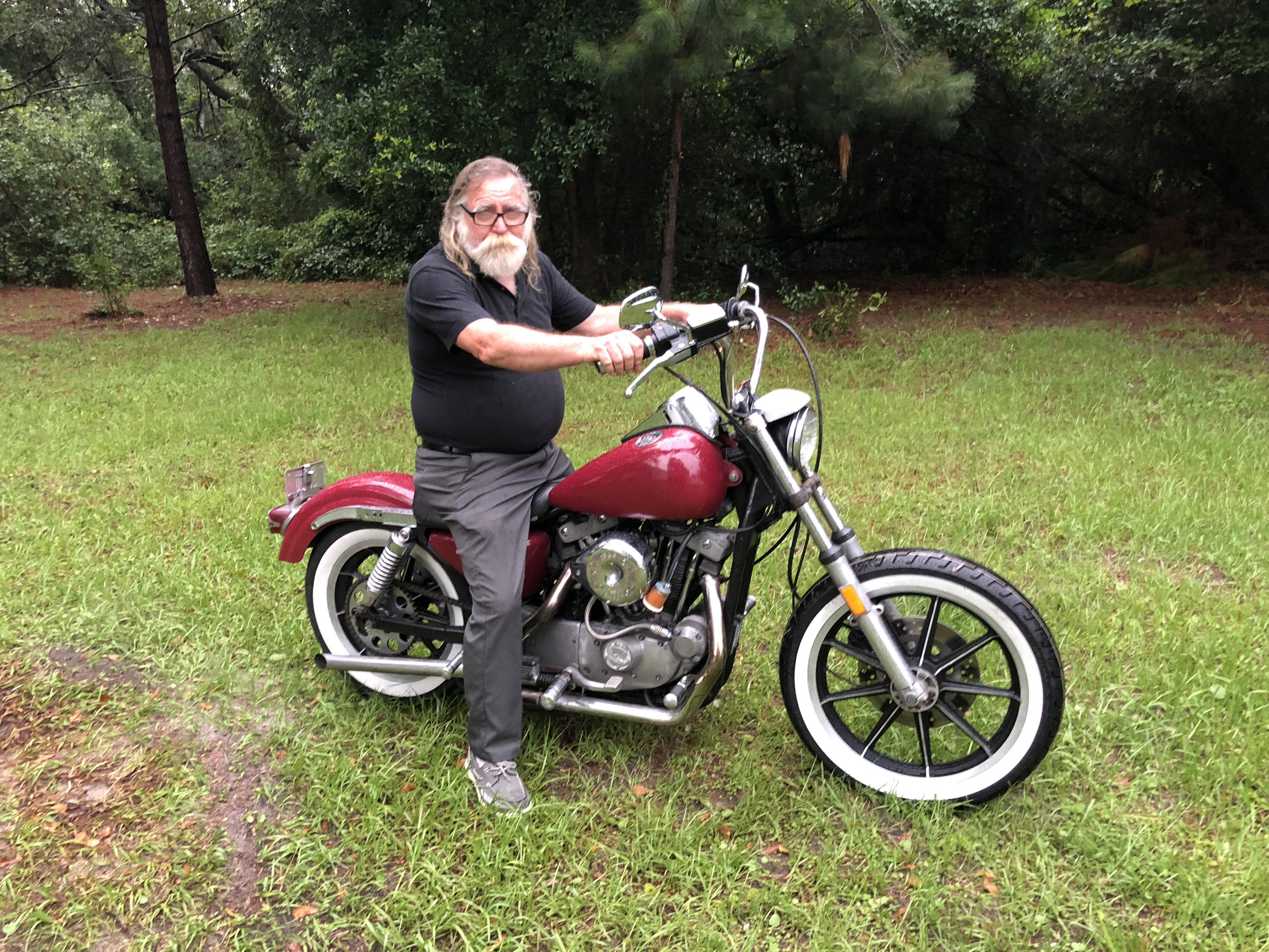 After he passed it to me, my grandpa sitting on my freshly restored 1984 sportster xlx1000