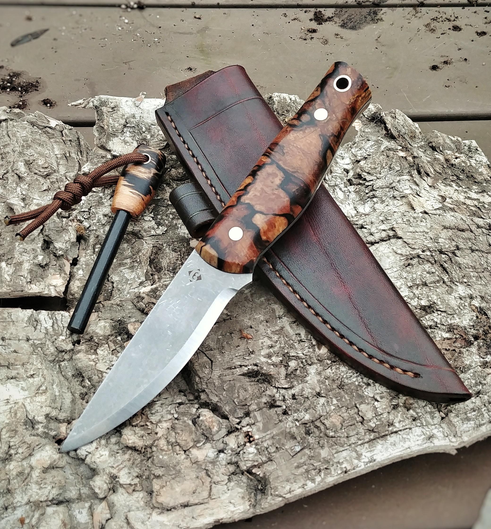 A bushcraft knife , inspired on the Skookum bush tool. It has my