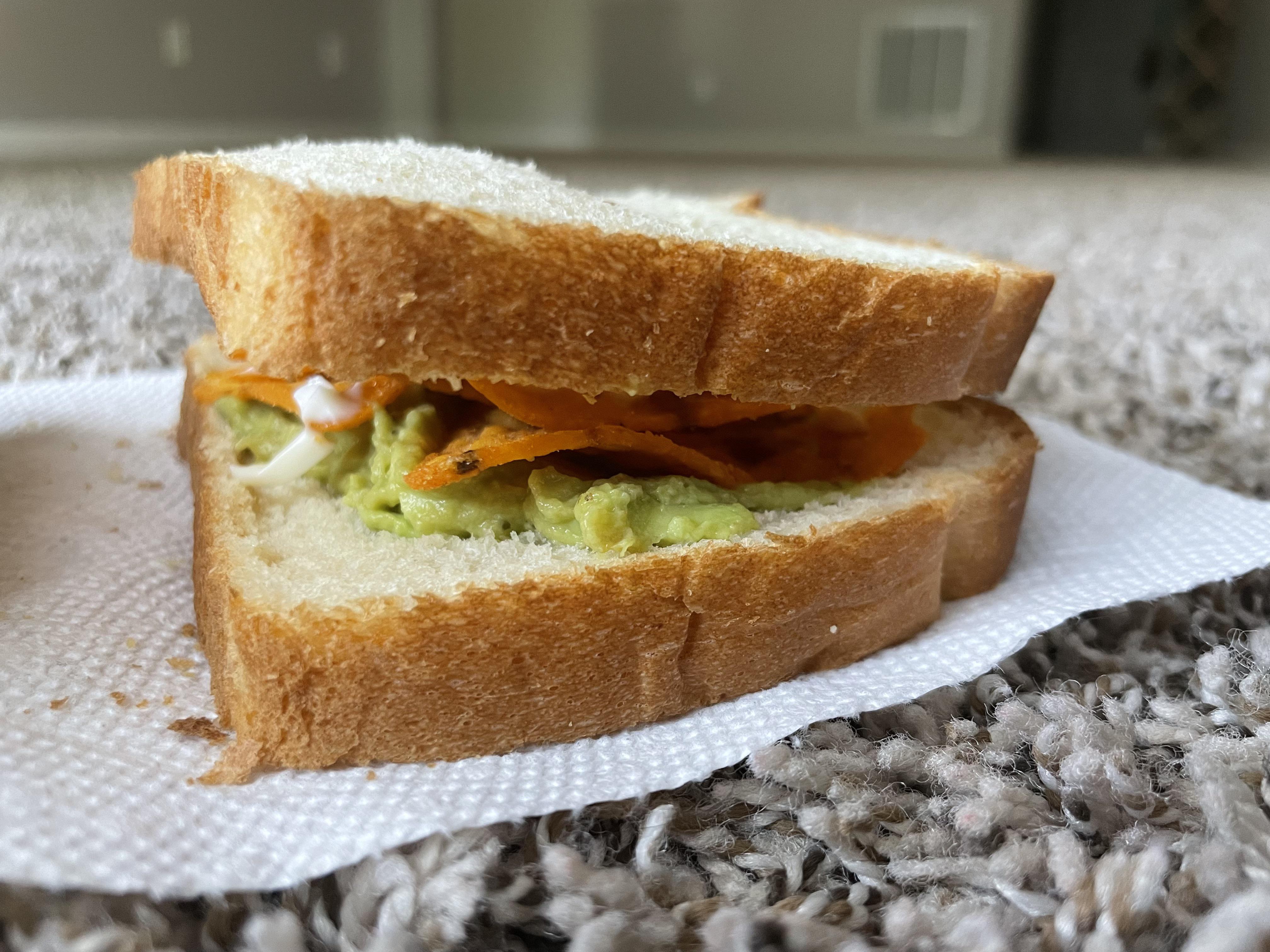 Guac, sweet chili Doritos, mayo, and smoked Tabasco on potato bread