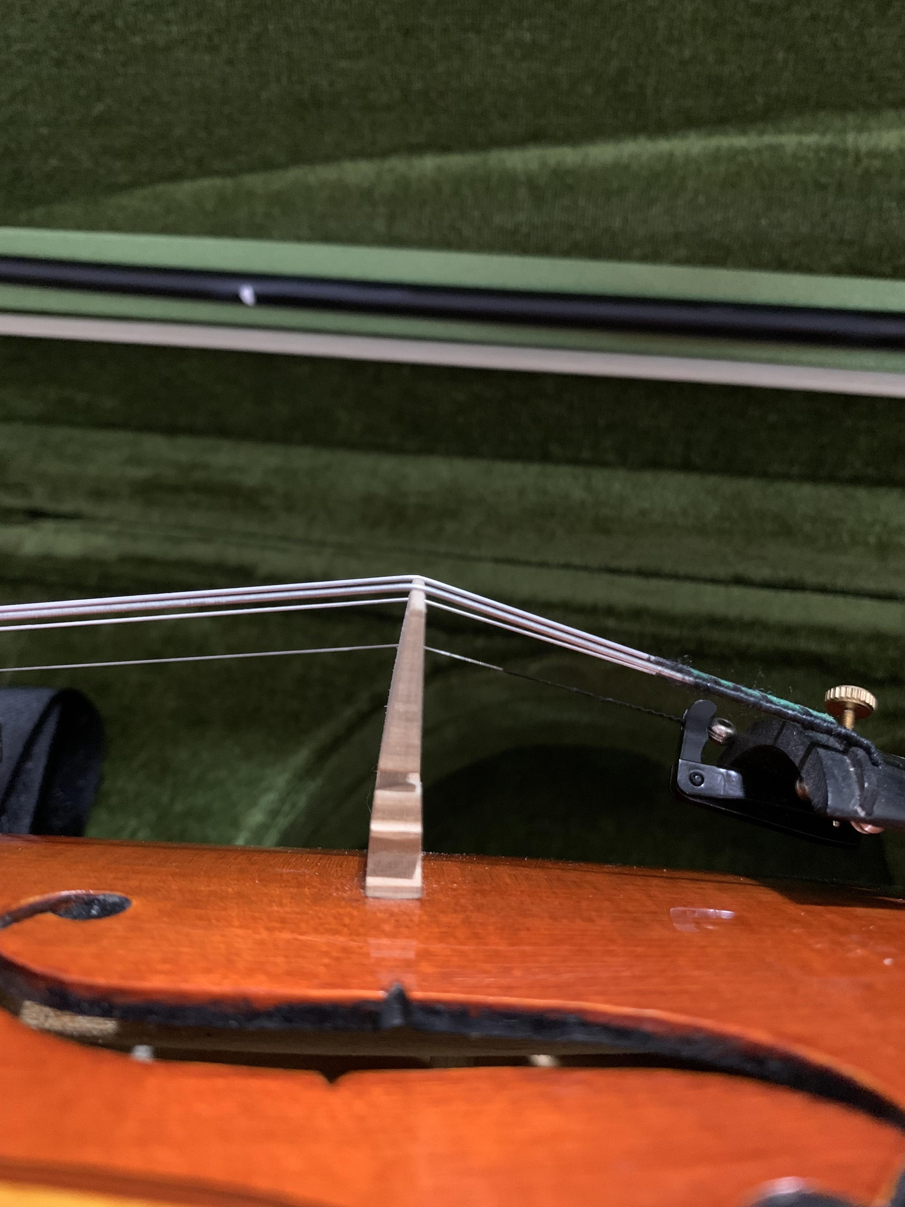 Bent bridge? My teacher says it’s fine, i feel like it’s bending. New