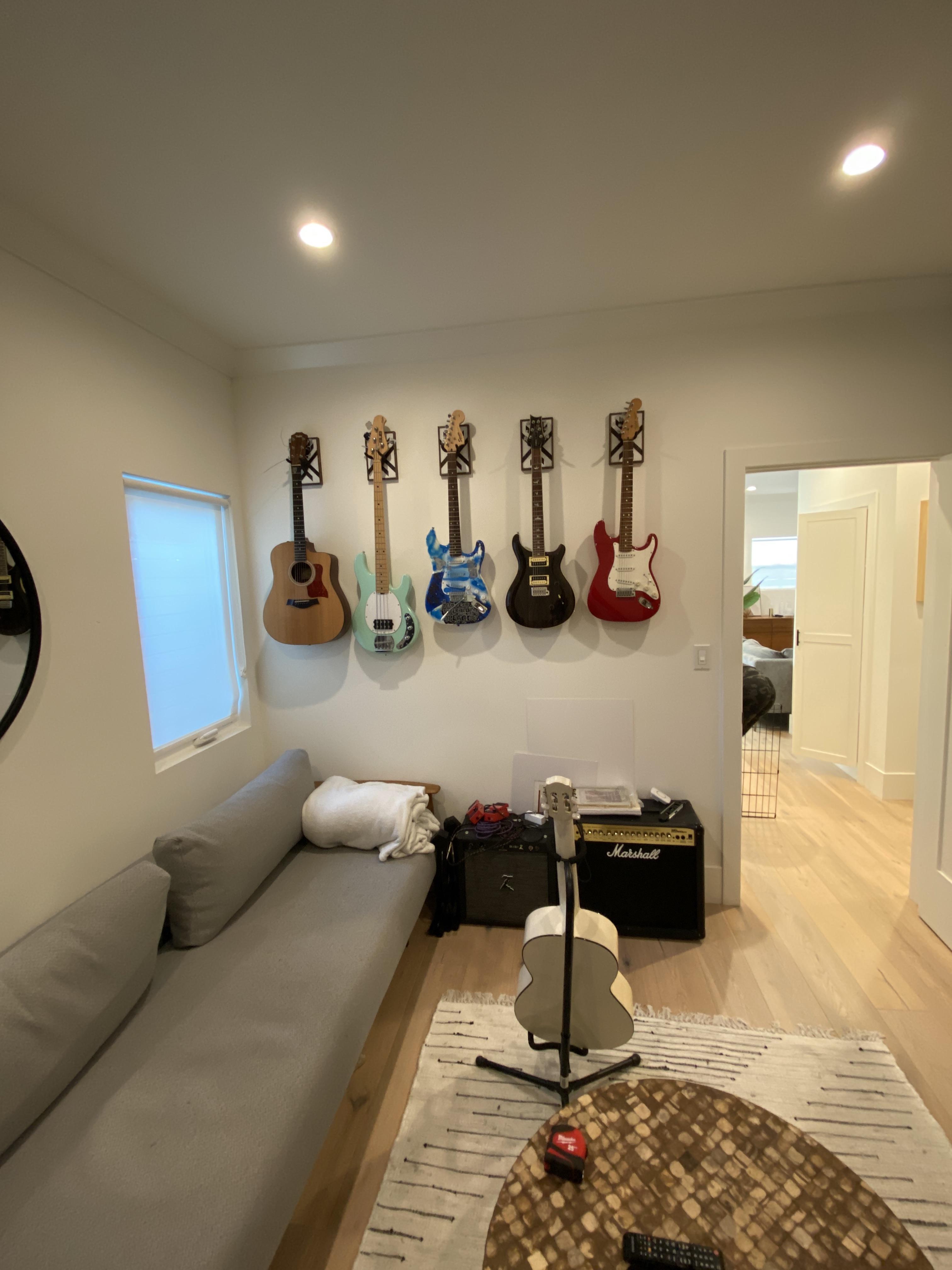 I hung my guitars up in the music / lounge room. It feels totally off. What should I change? r