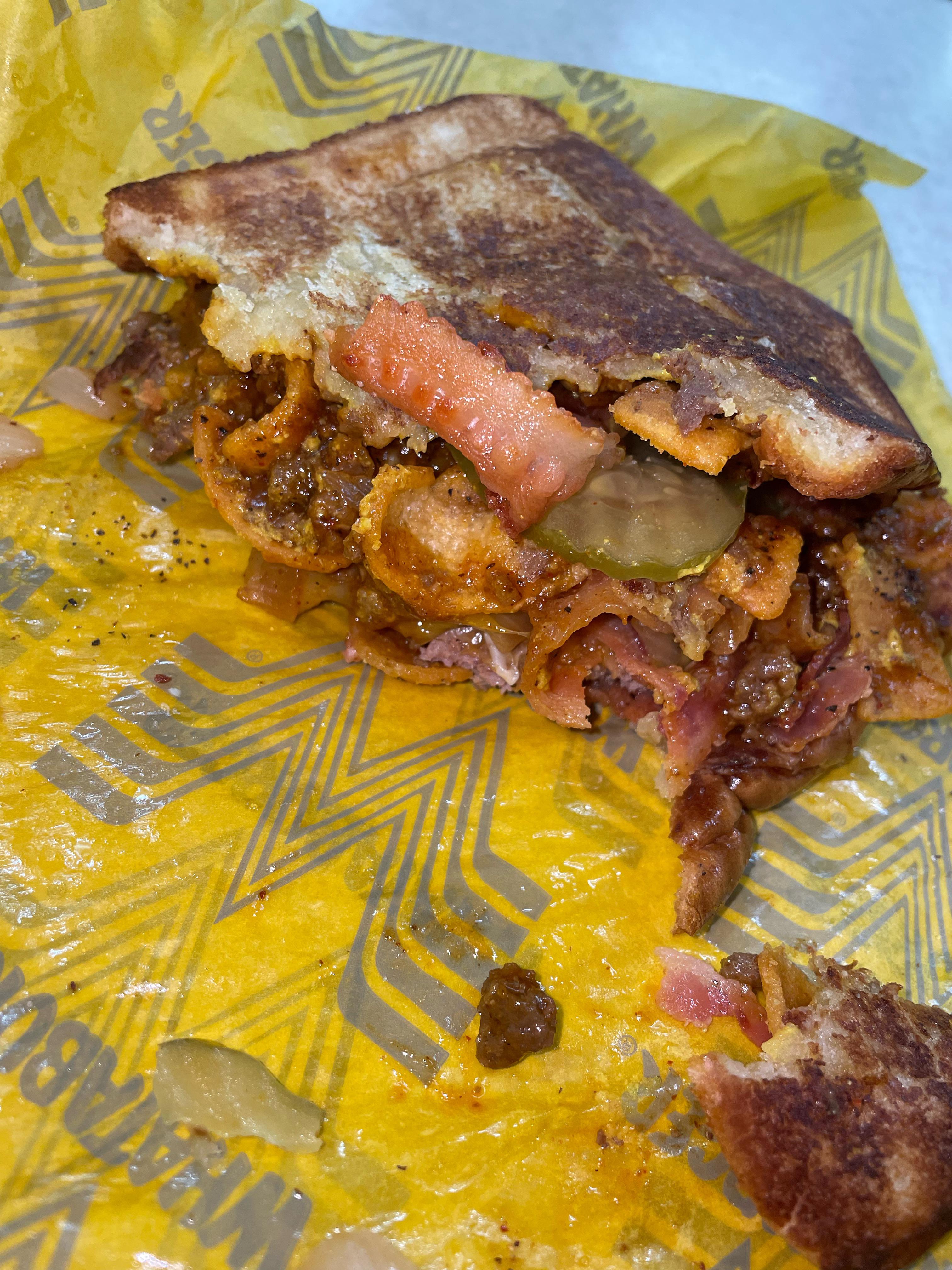 Frito Chili Cheese Burger w/Shredded Cheese blend, bacon, grilled