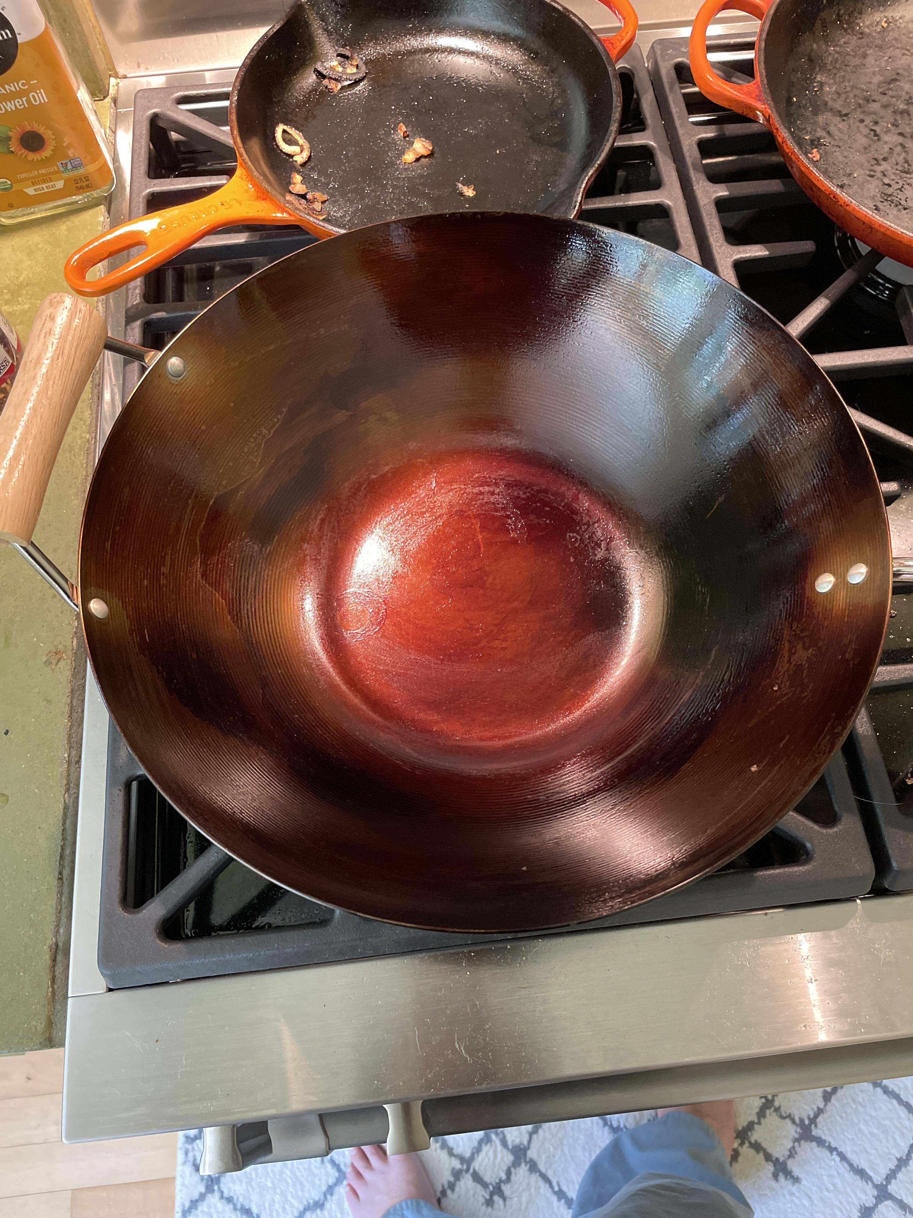 Used peanut oil and followed the instructions gas burner carbon steel