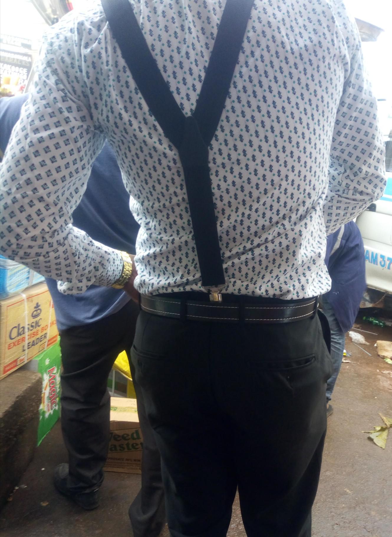 Suspenders and a belt at the same time. New fashion trend or