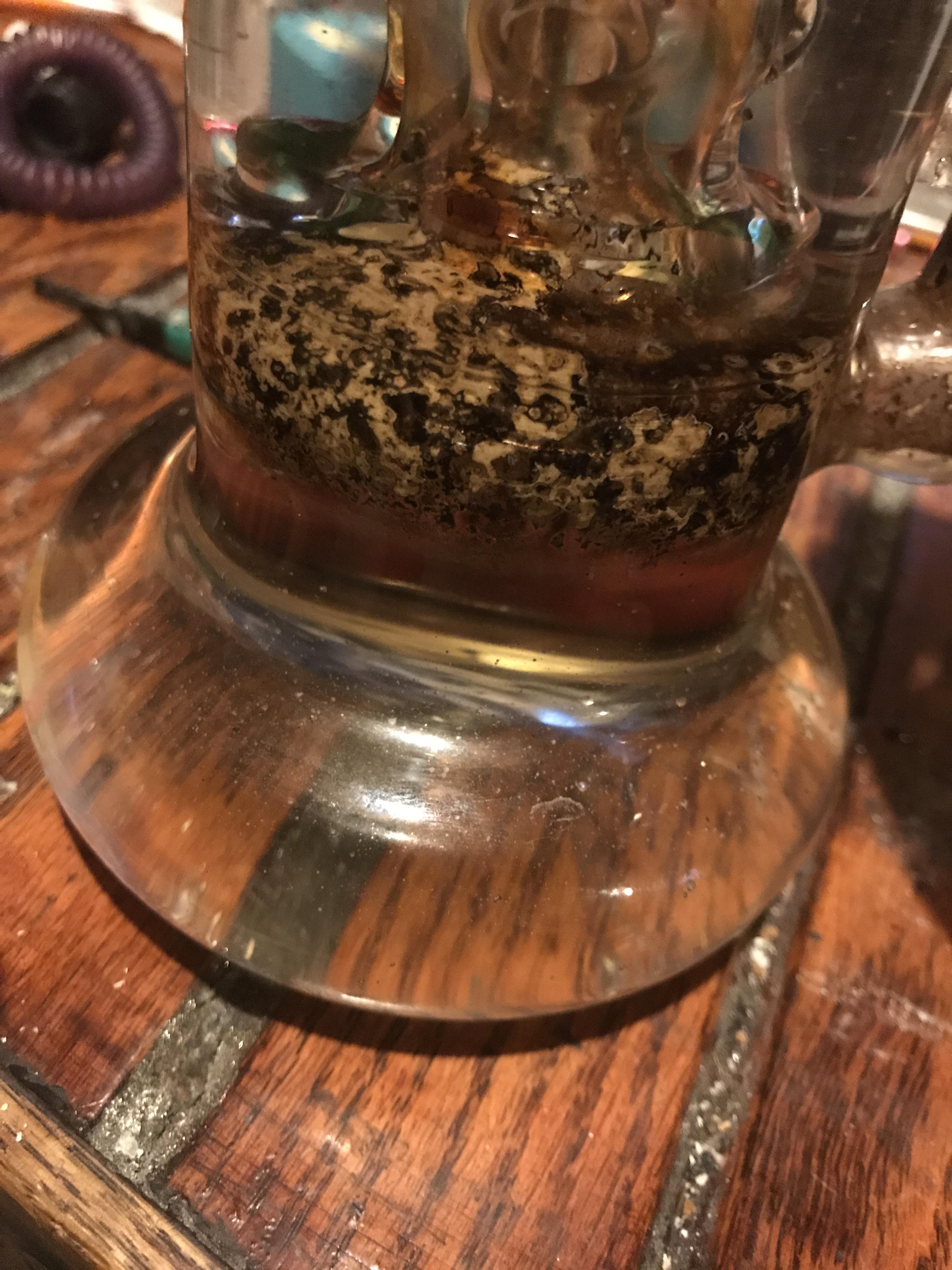 Does anybody know what this stuff in my bong is could it be res or mold