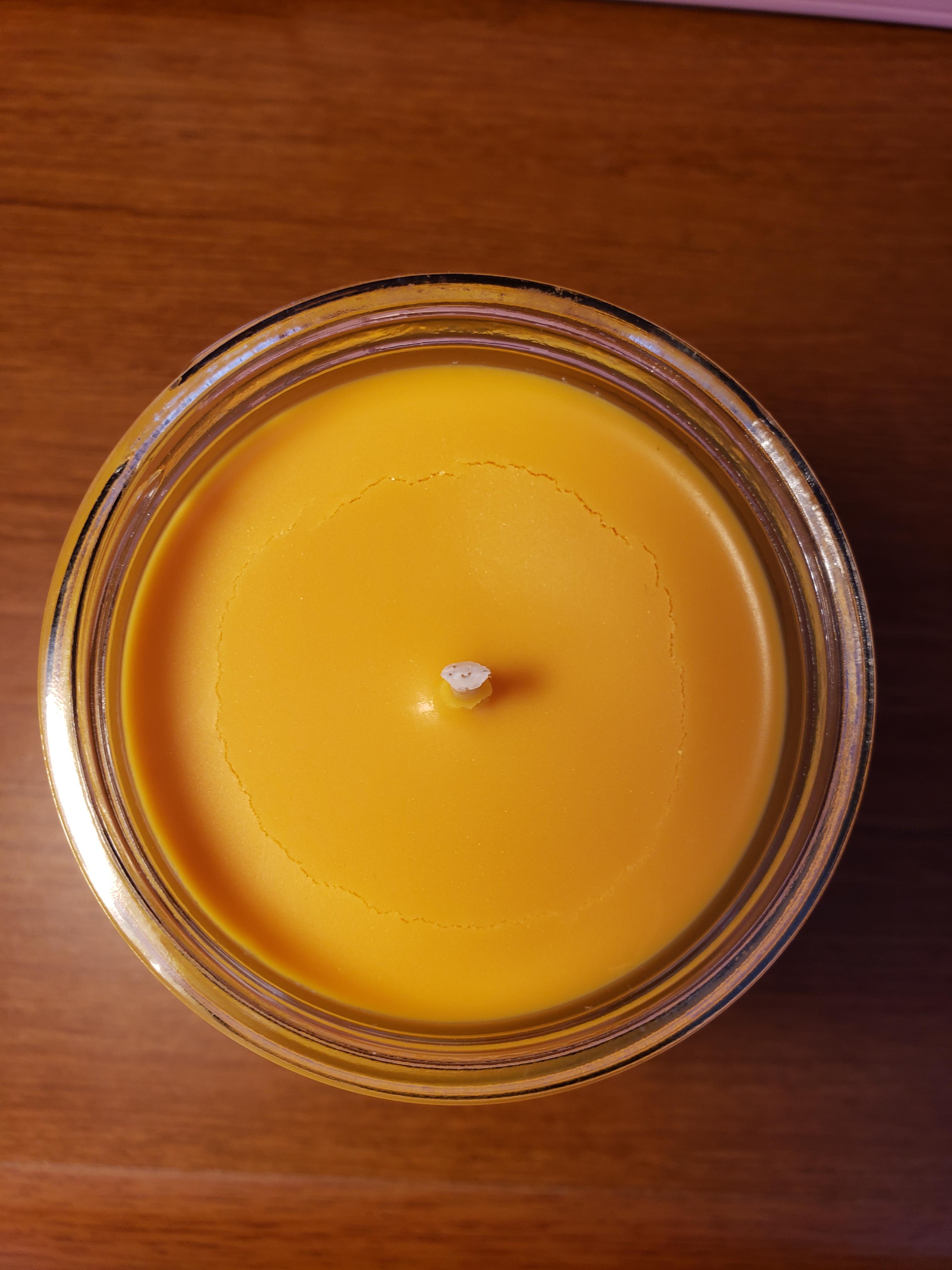 Does anyone know why I get this cracking on the surface of my candles