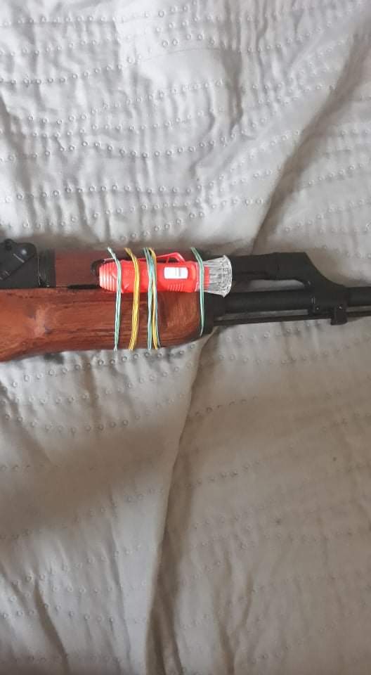 Who needs expensive rails and tactical flashlights when you got a cheap flashlight and a bunch