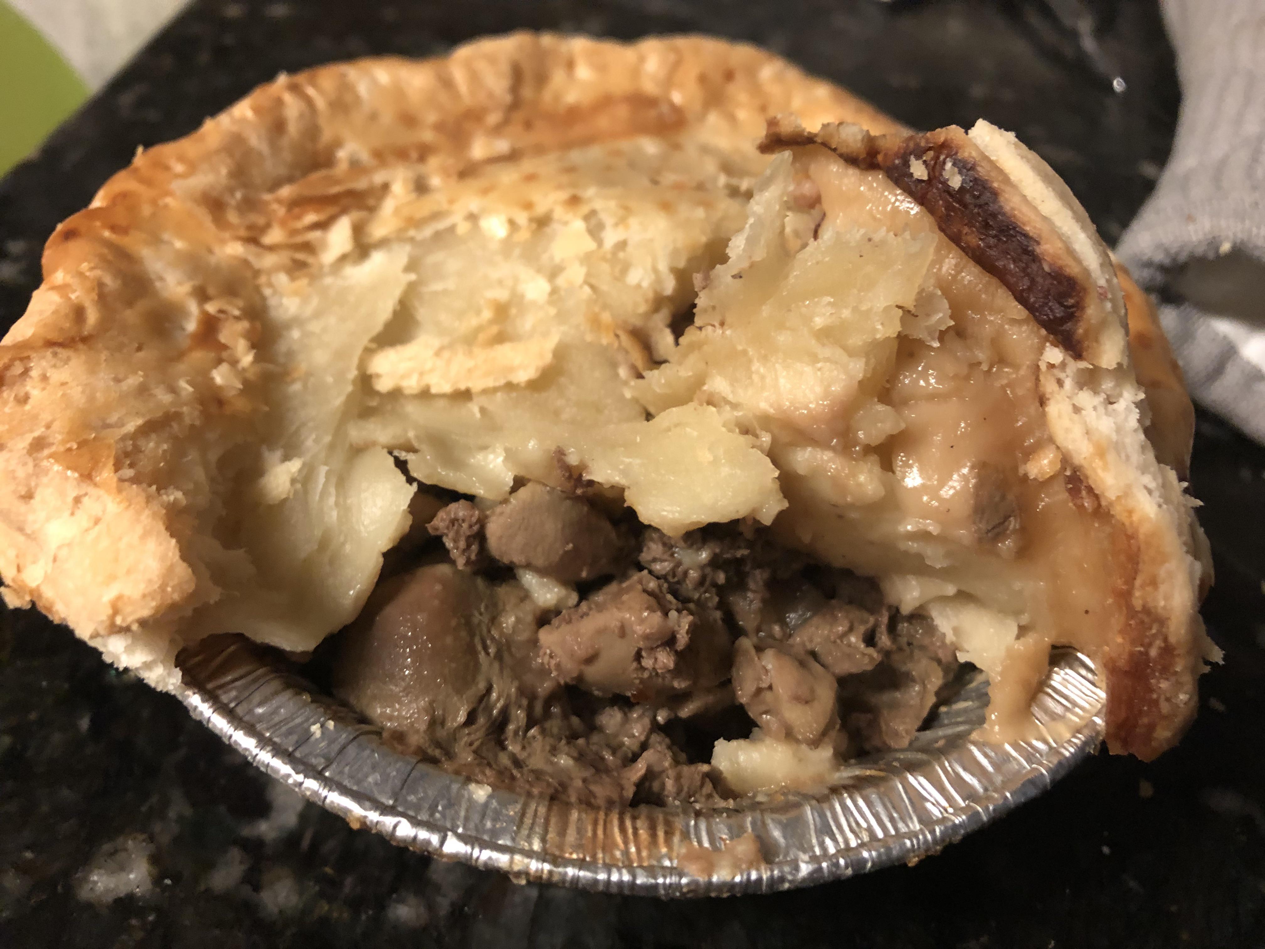 My first time eating a steak and kidney pie that I found at a liquor