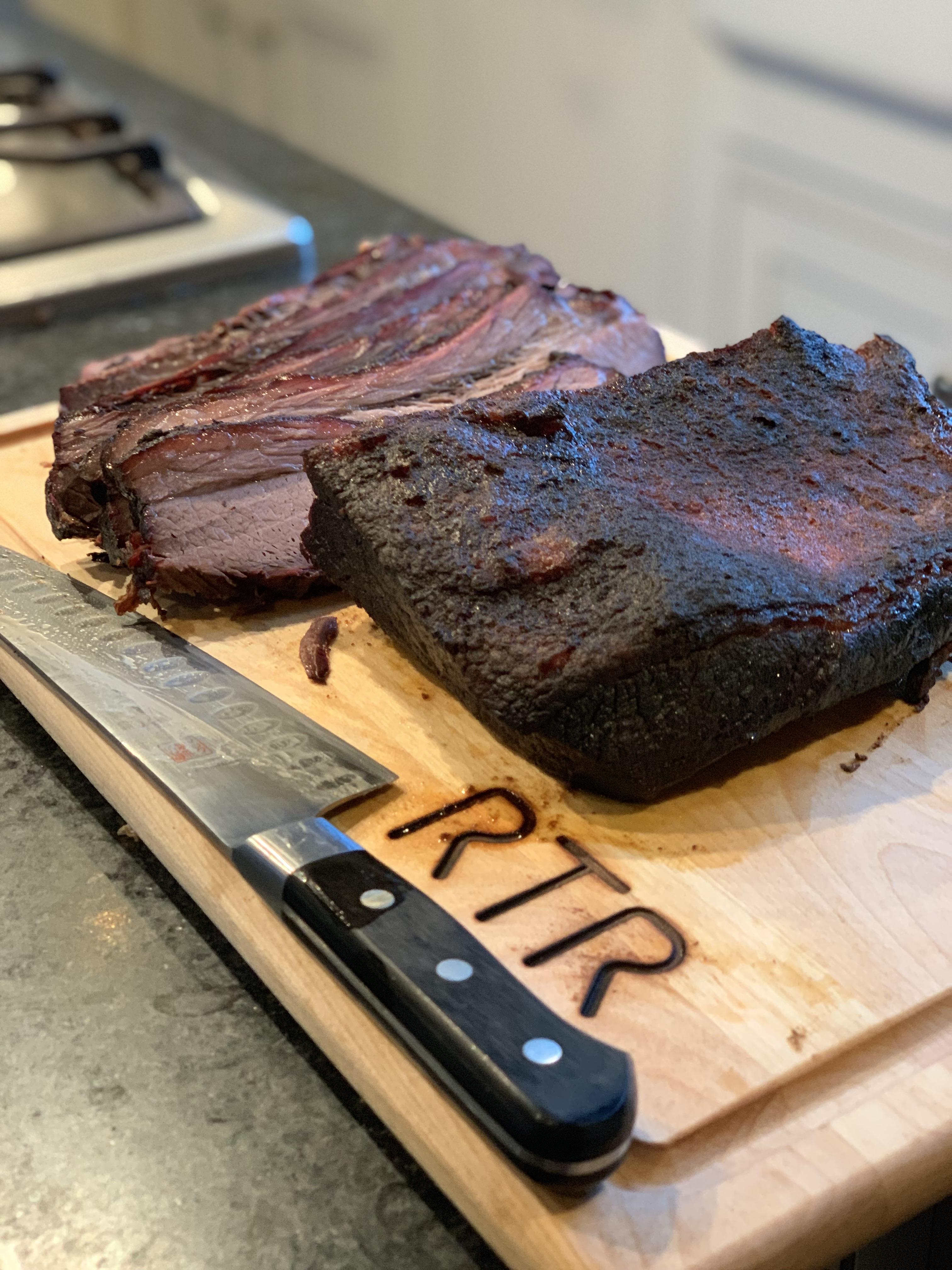 My first smoked brisket on my favorite cutting board. r/pics