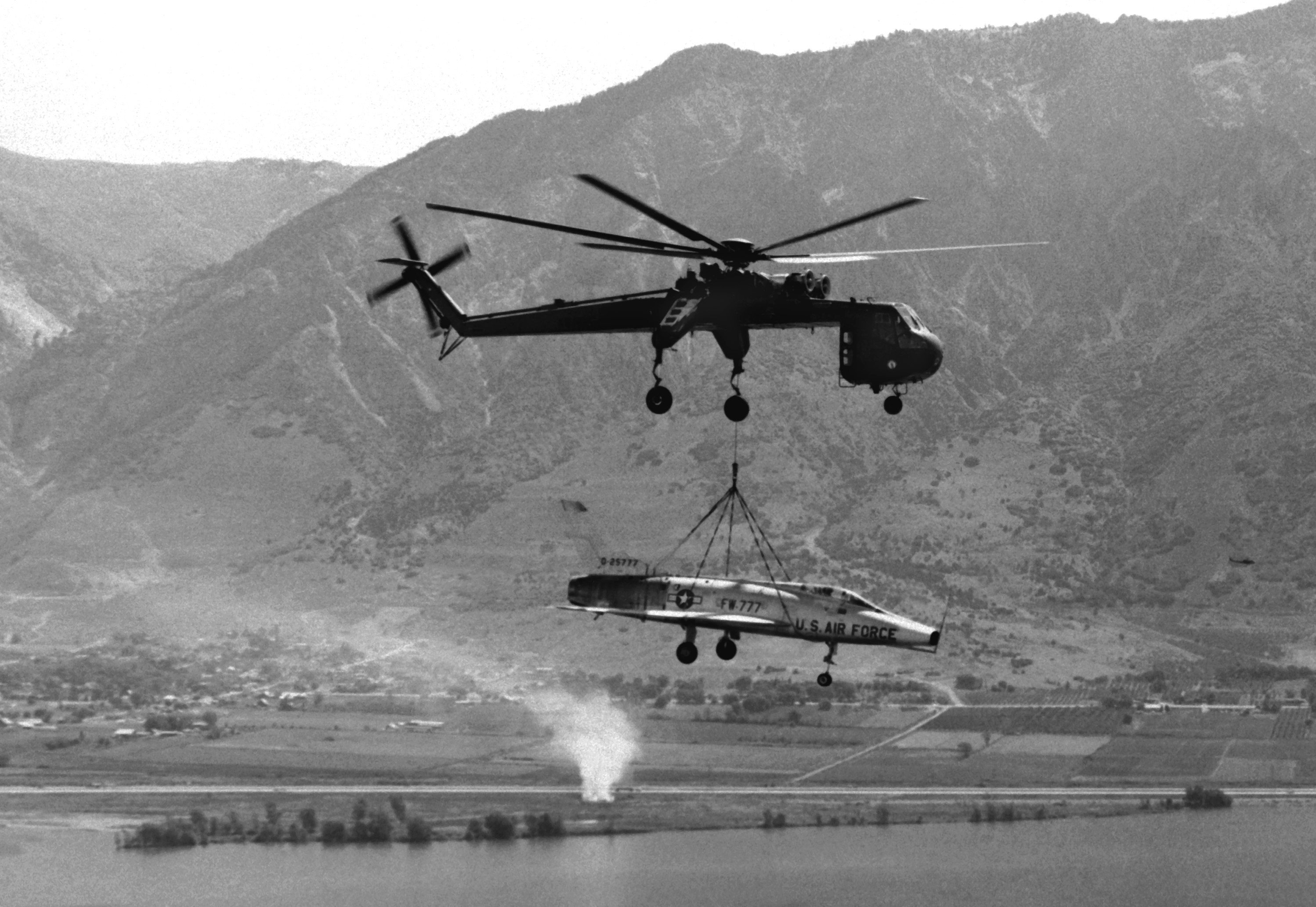 CH54 Skycrane helicopter with an F100 Super Sabre from 388th Tactical