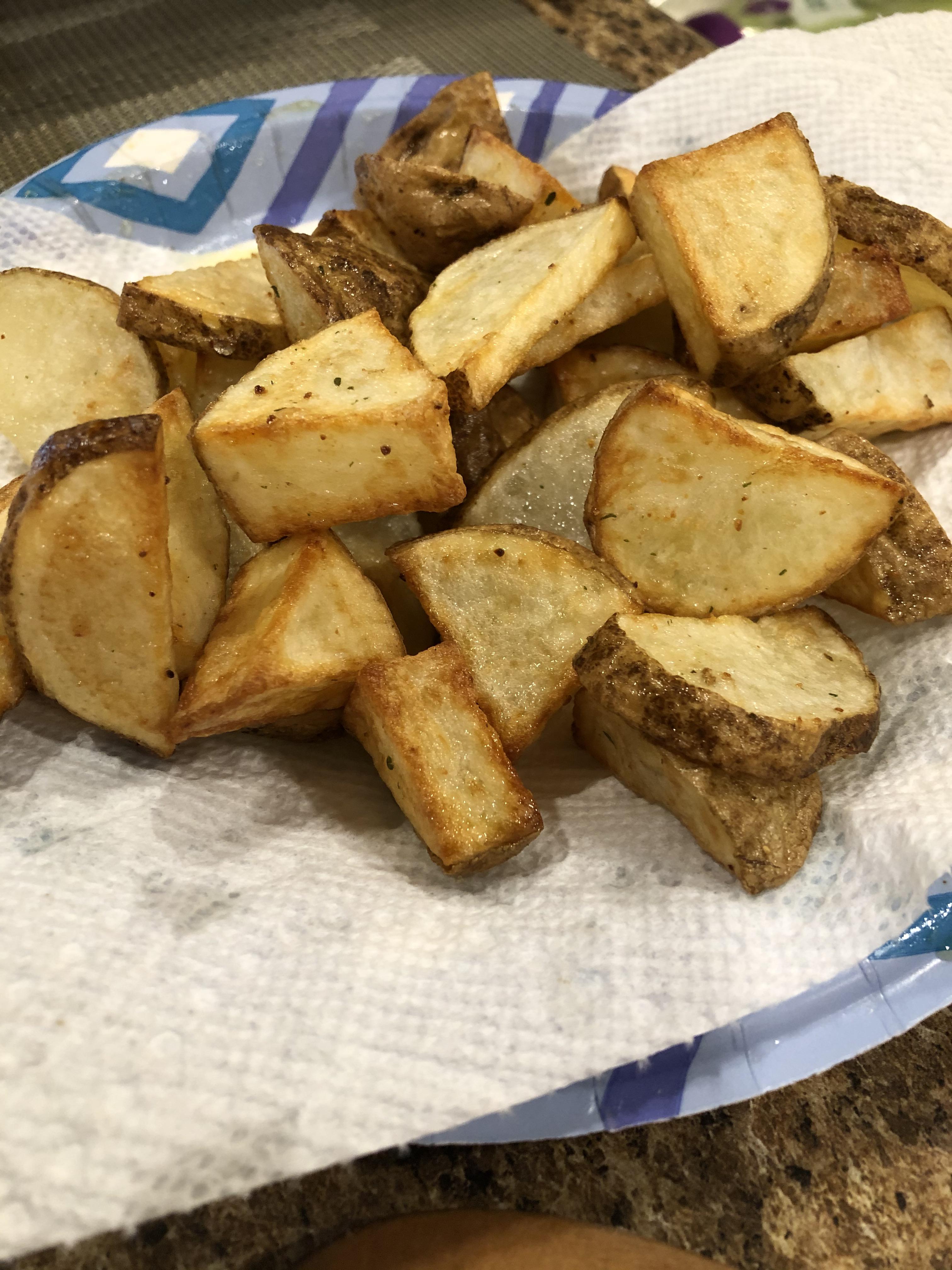 Easy potatoes cover in olive oil and garlic salt, 400 degrees for 15