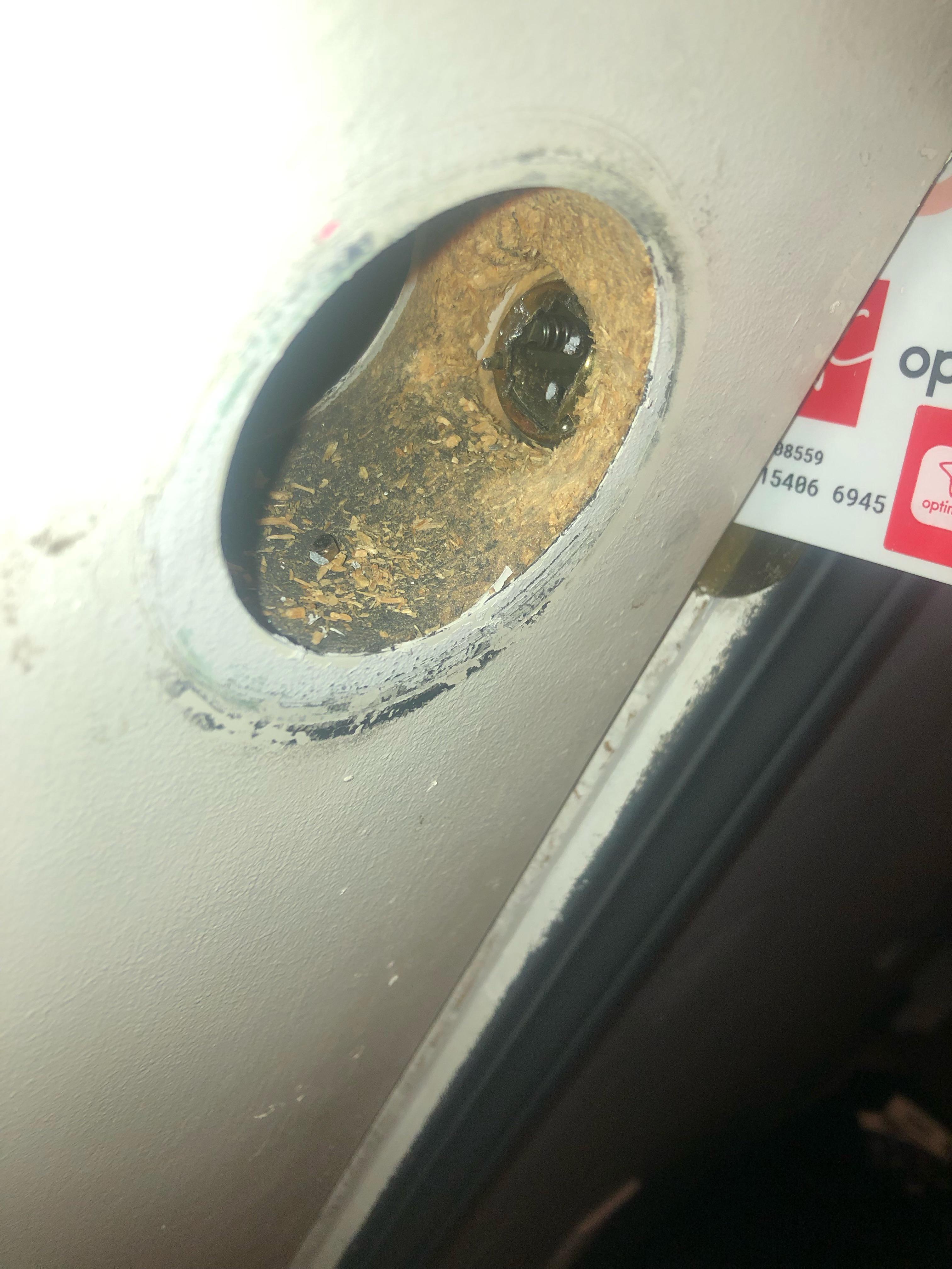 I foolishly tried to break a door knob out of my door when it stopped