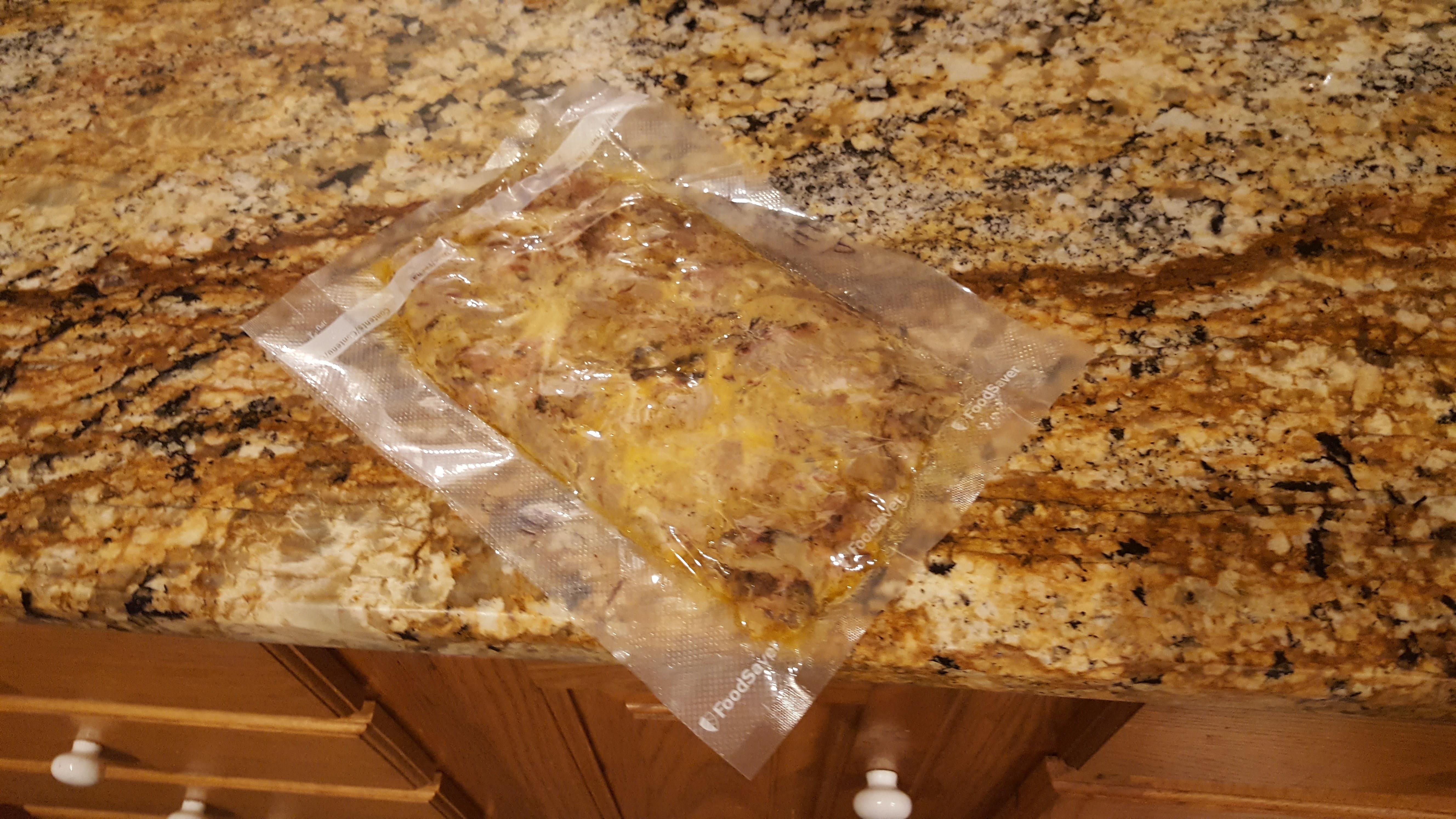 This vacuum packed pulled pork bbq on the kitchen counter r