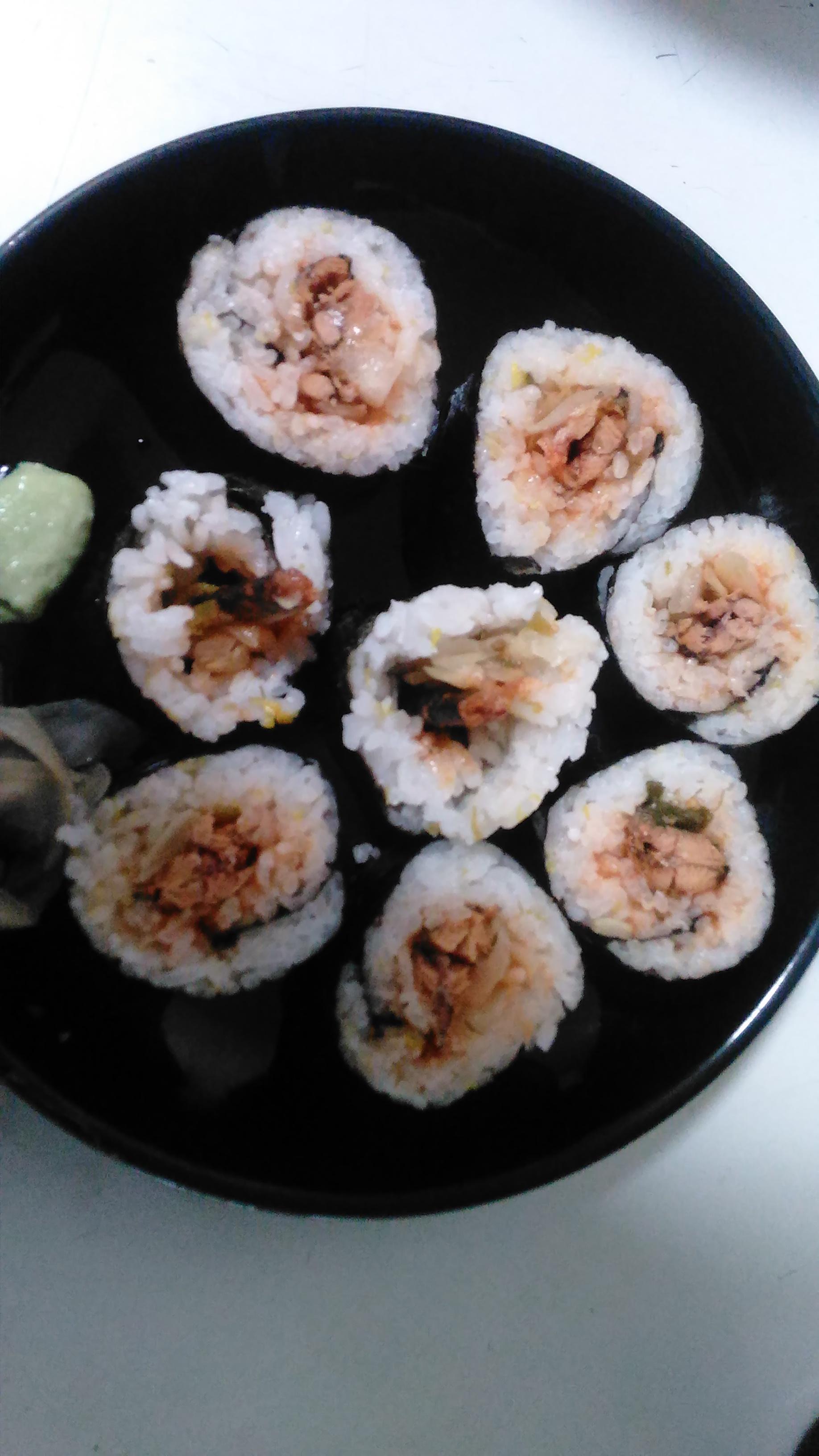 Sardines in tomato sauce rolled with dilled home fermented sauerkraut