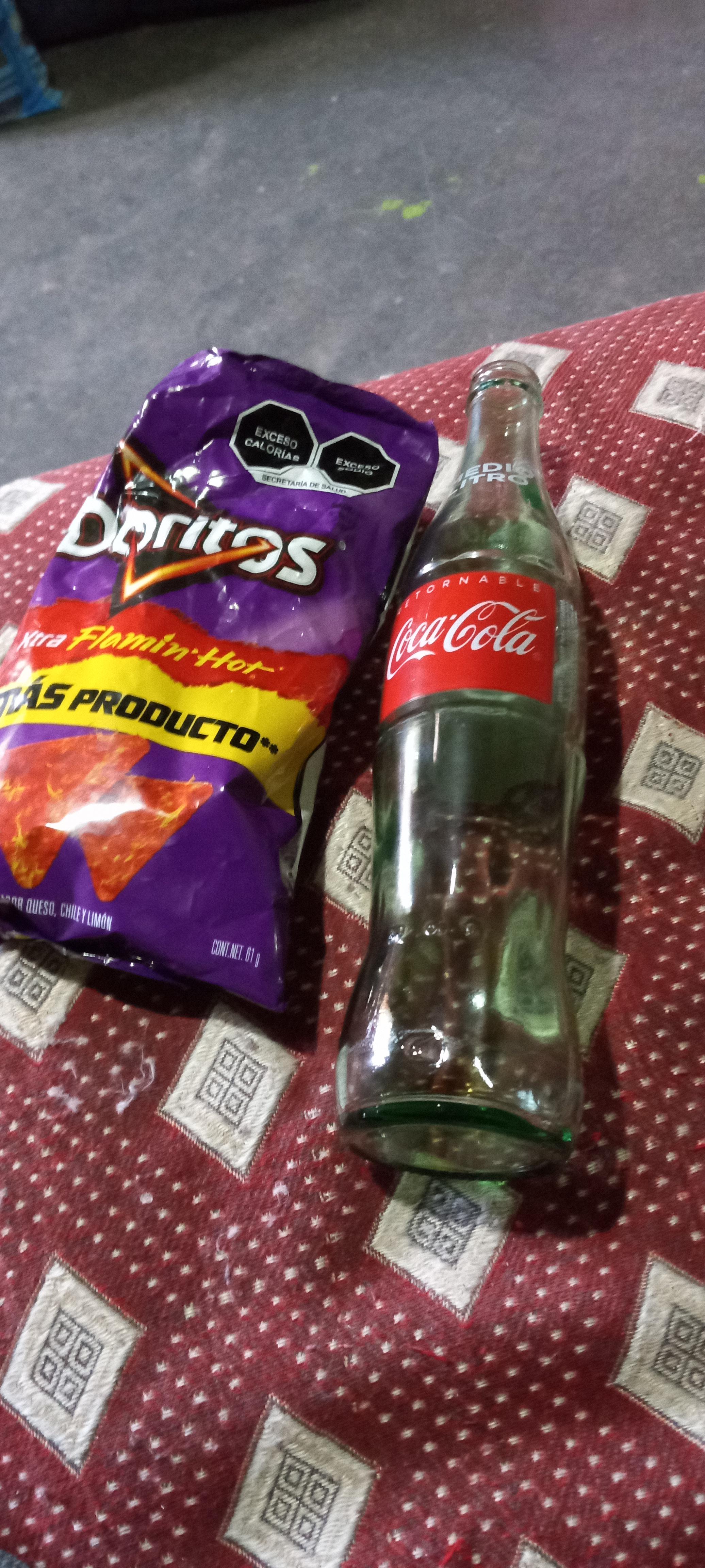 Bag of chips and a 500ml coke bottle will cost you 28 mexican pesos or 1.36 United States