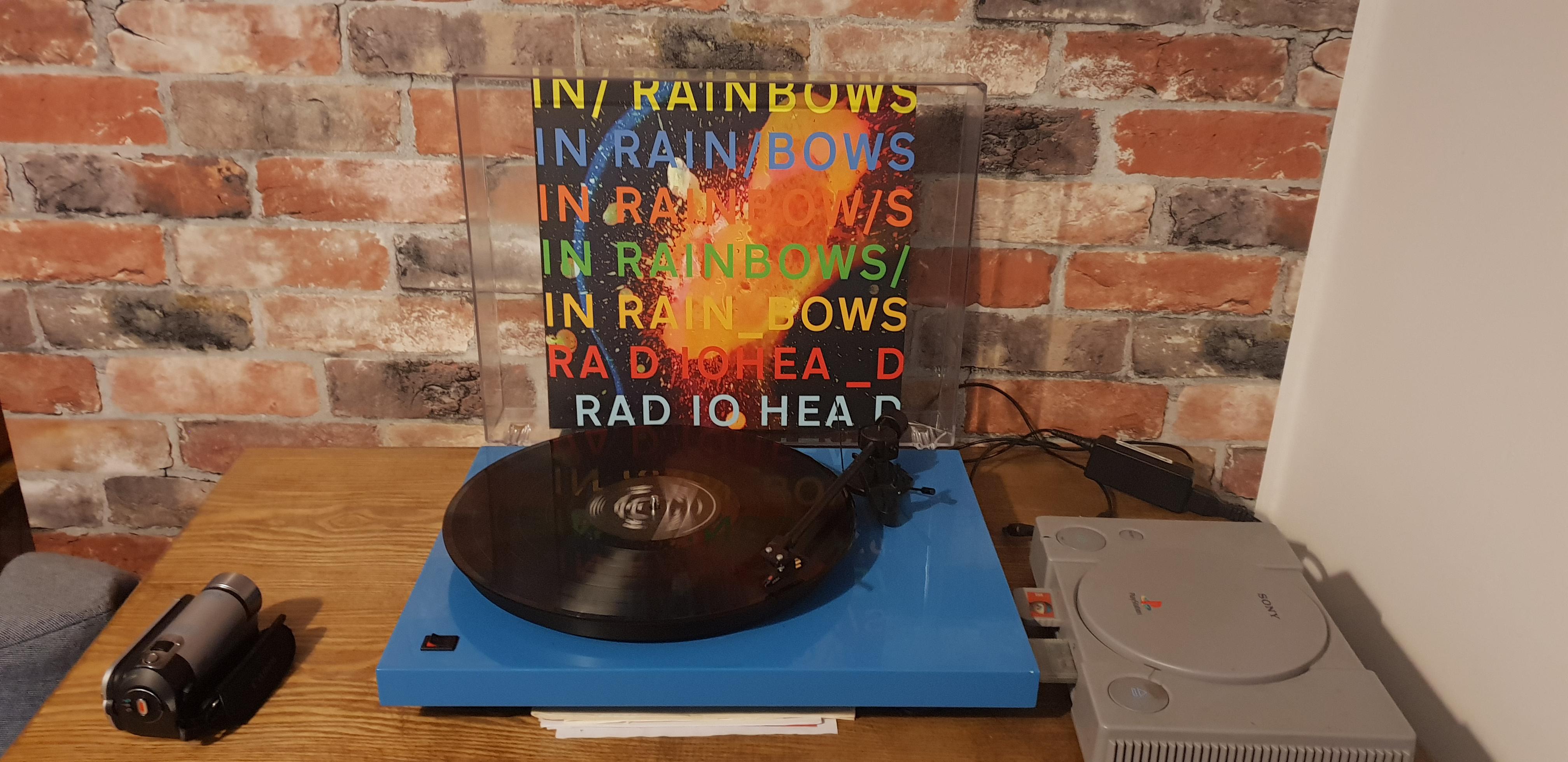 Turntable is a ProJect Debut T2. There's an Onkyo A9010 on the left with Q Acoustics 1010