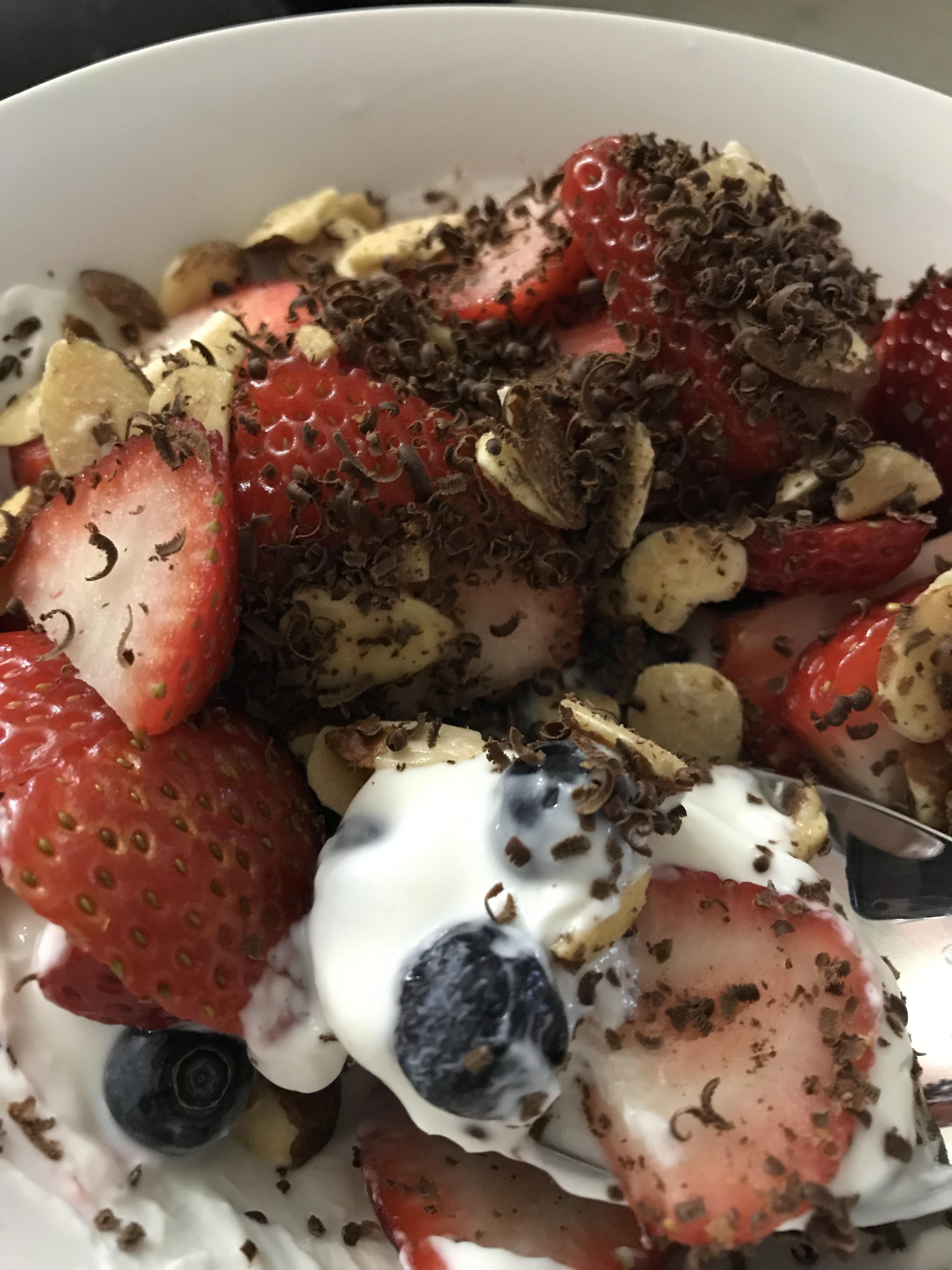 190 Calories on a berry Parfait. 1/2 cup plain greek yogurt 1/2 cup