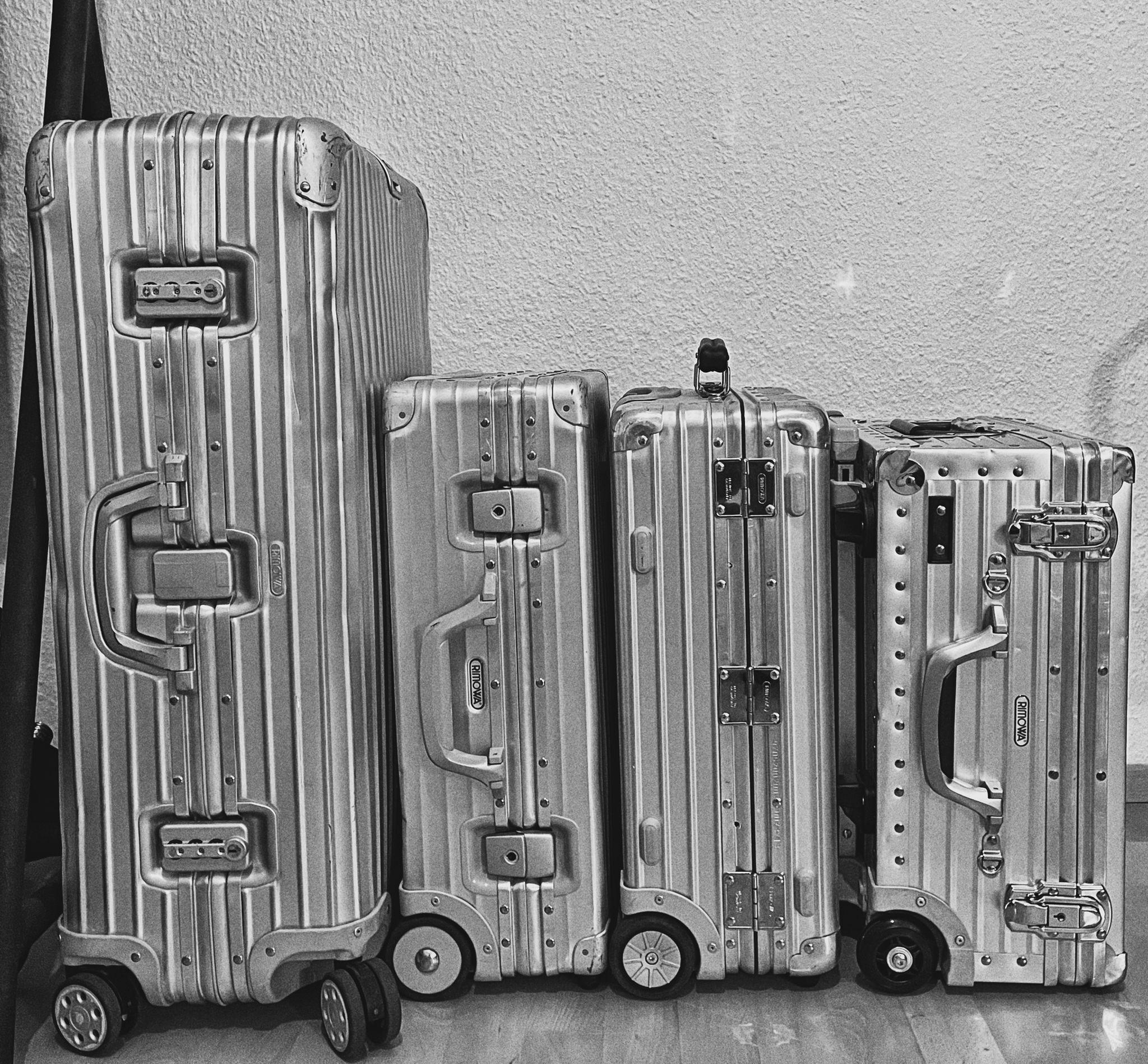 Rimowa Luggage in black and white r/Rimowa