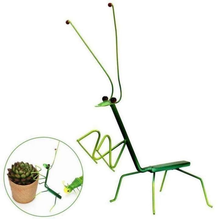 We got this praying mantis, made in iron, for the indoor plants. They