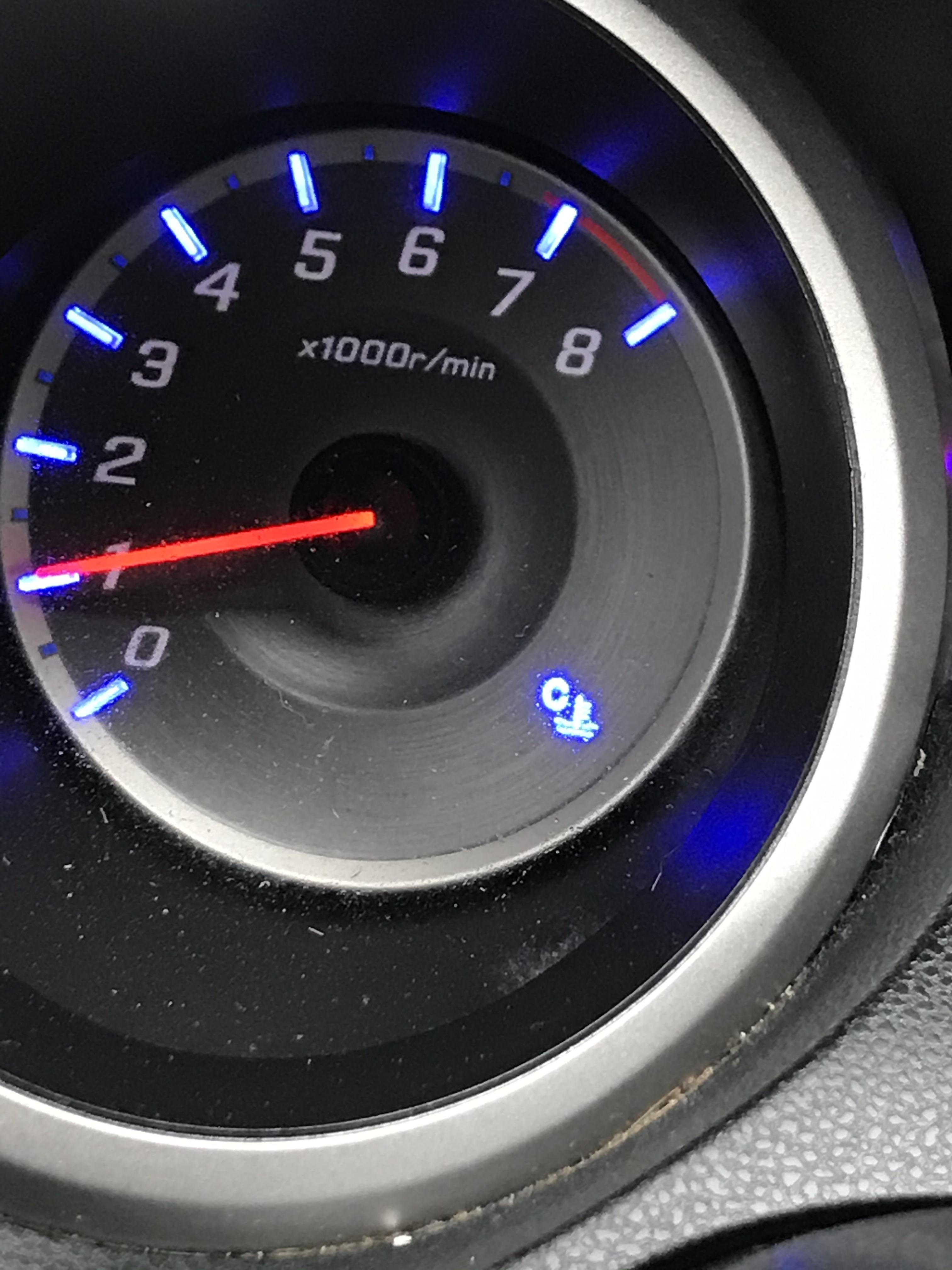 Anybody know what this blue light is on my tachometer...? Something to