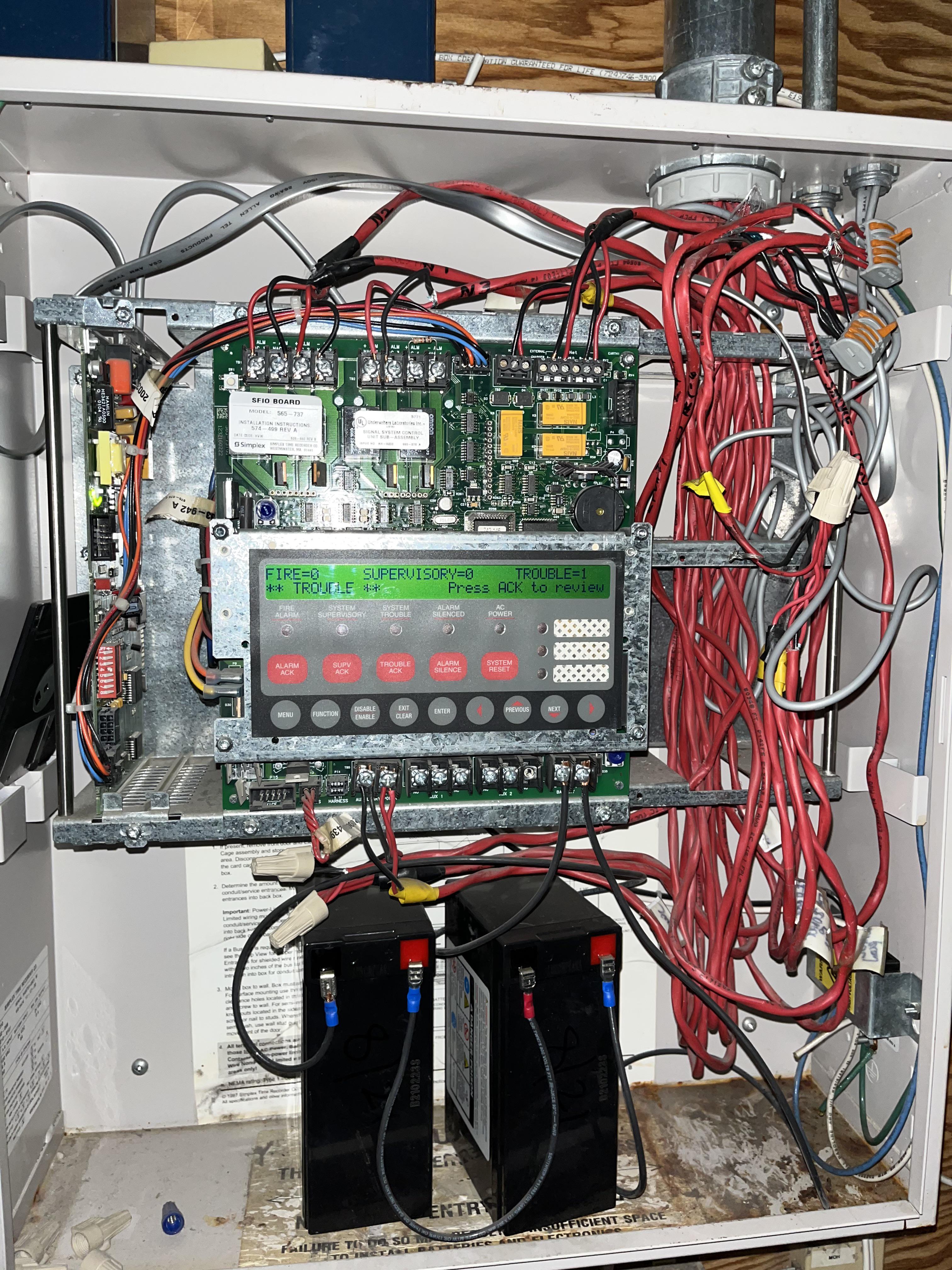 Building power is out and this alarm won’t stay silenced. Can I just