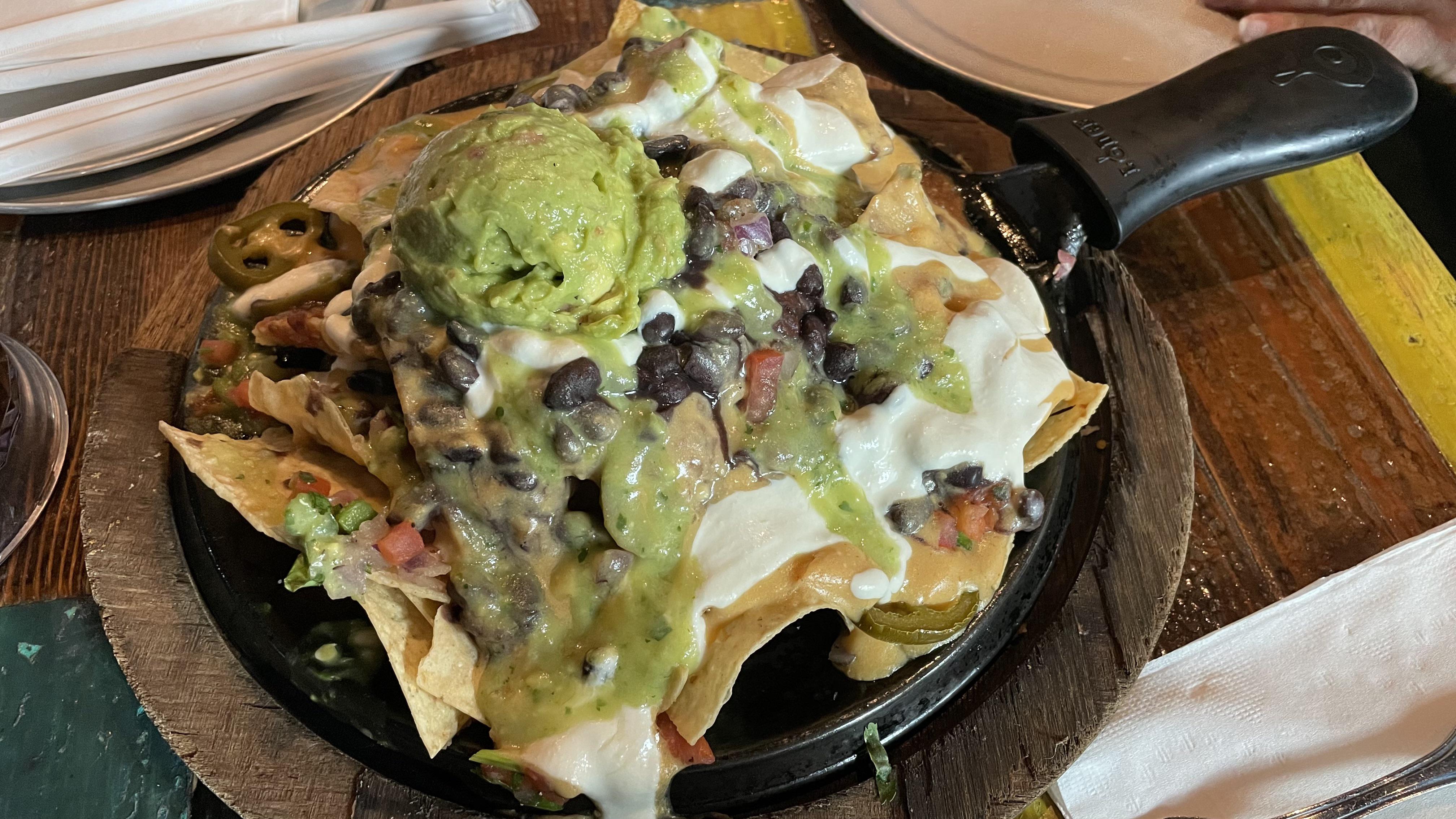 Vegan loaded nachos from Nacho Daddy’s in Las Vegas. Outrageously