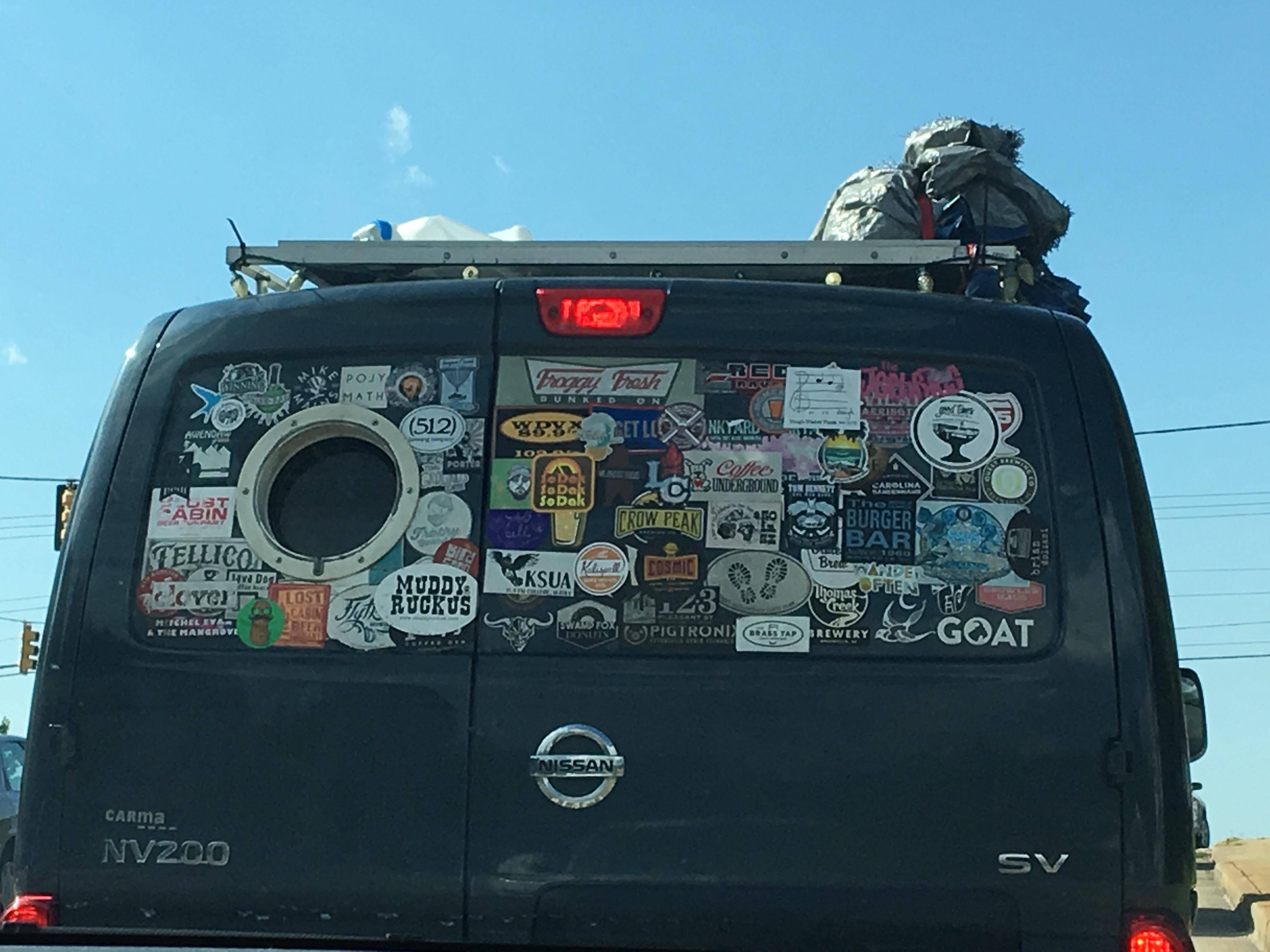 The back of this van has a porthole. r/mildlyinteresting