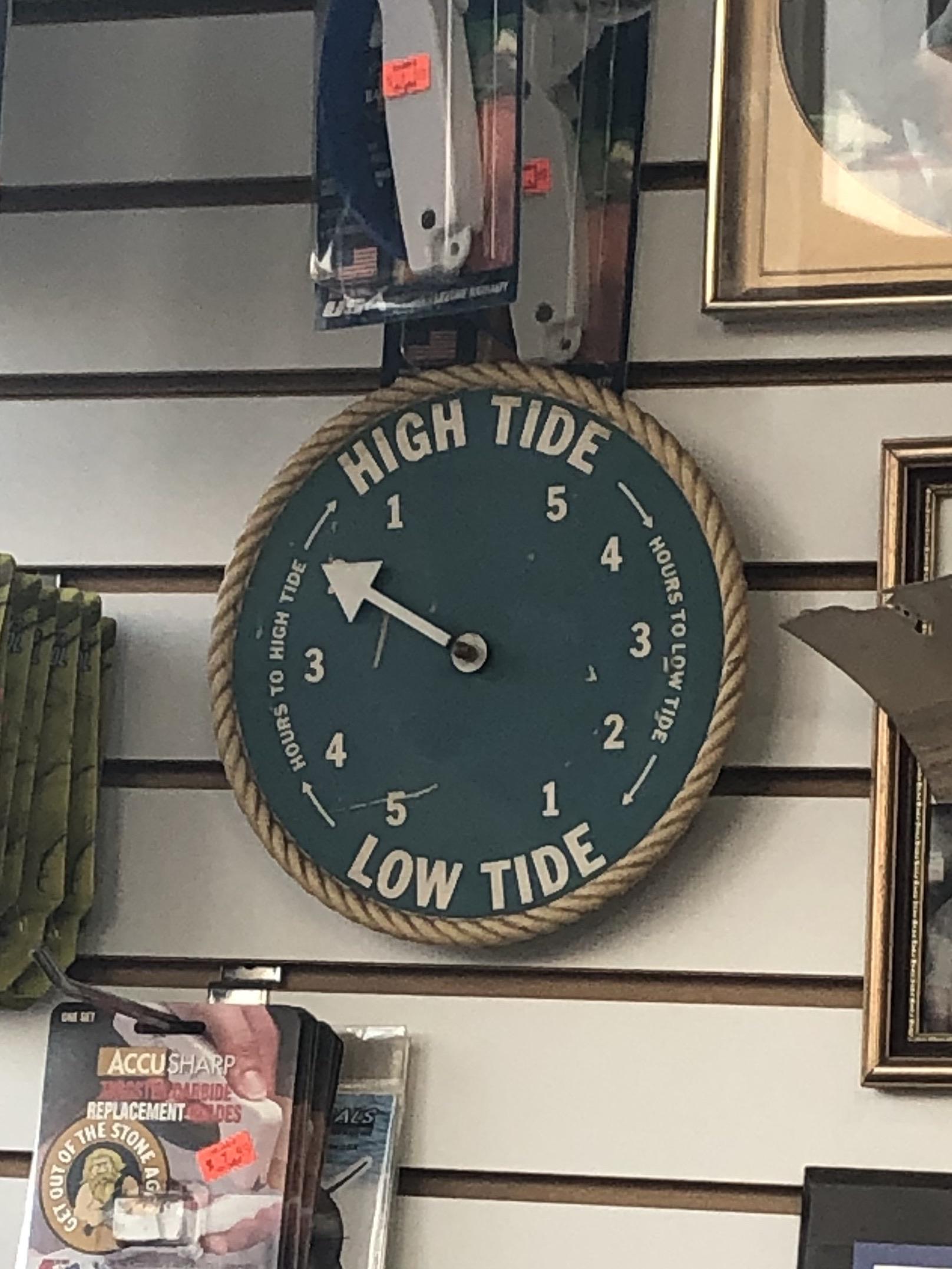This clock at a Bait and Tackle Shop that gives the hours until high