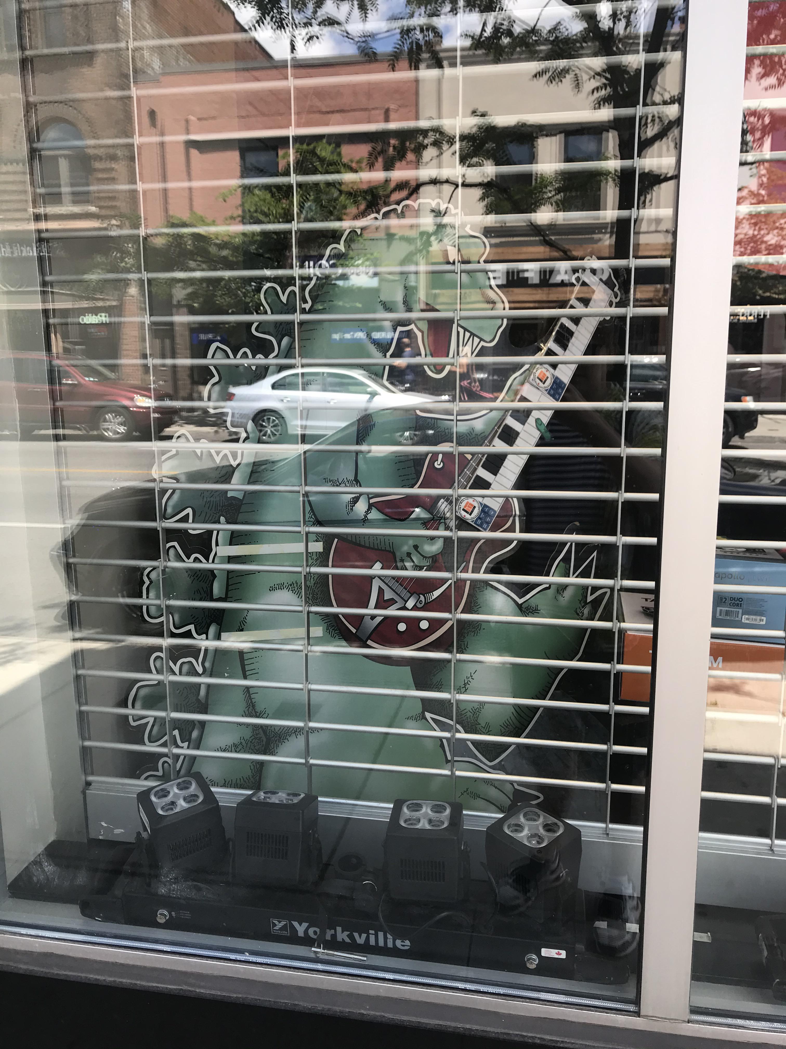 Met this fellow in one of the music stores in Toronto r/GODZILLA
