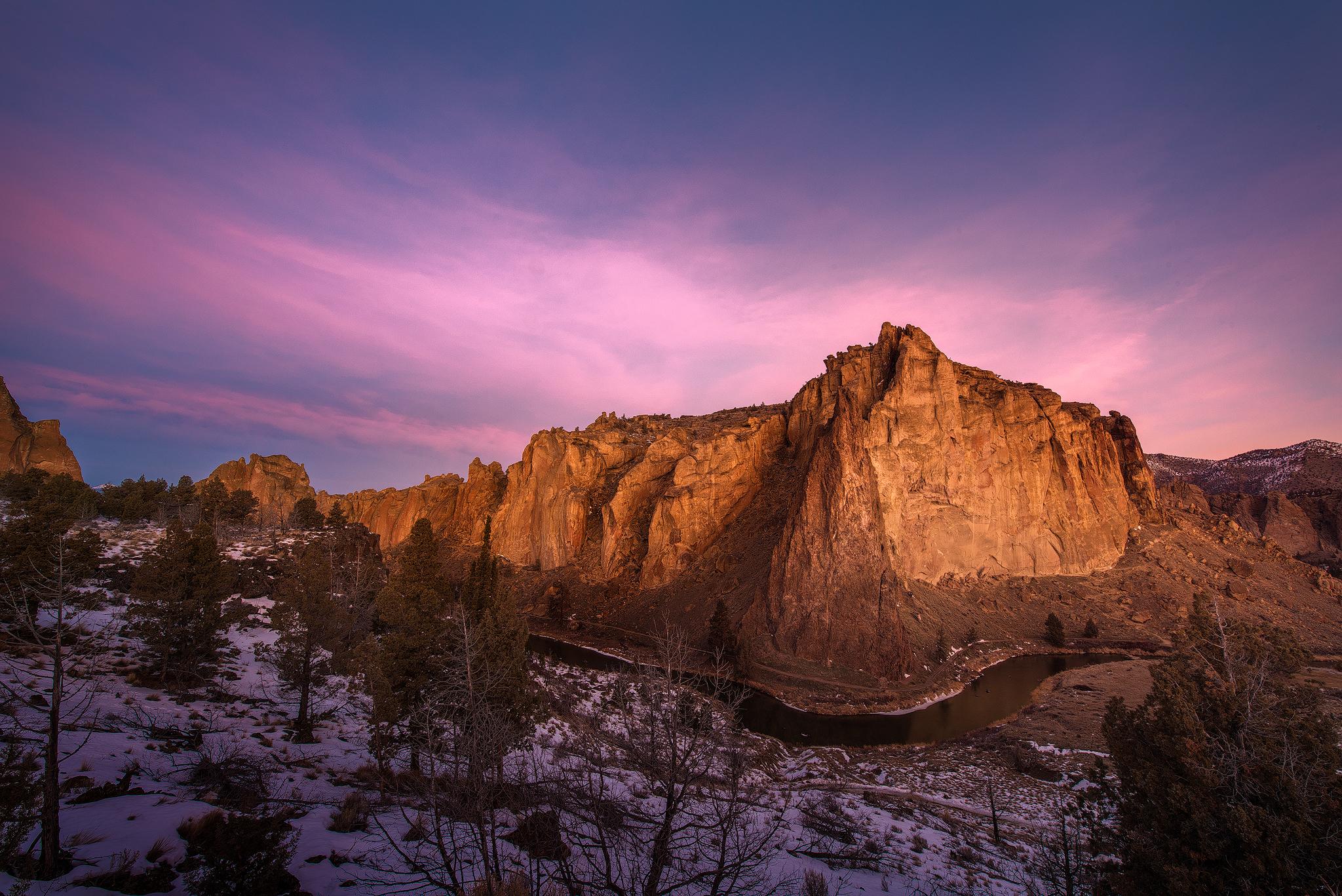 The sun beginning to touch the eastern faces of Smith Rock in Oregon