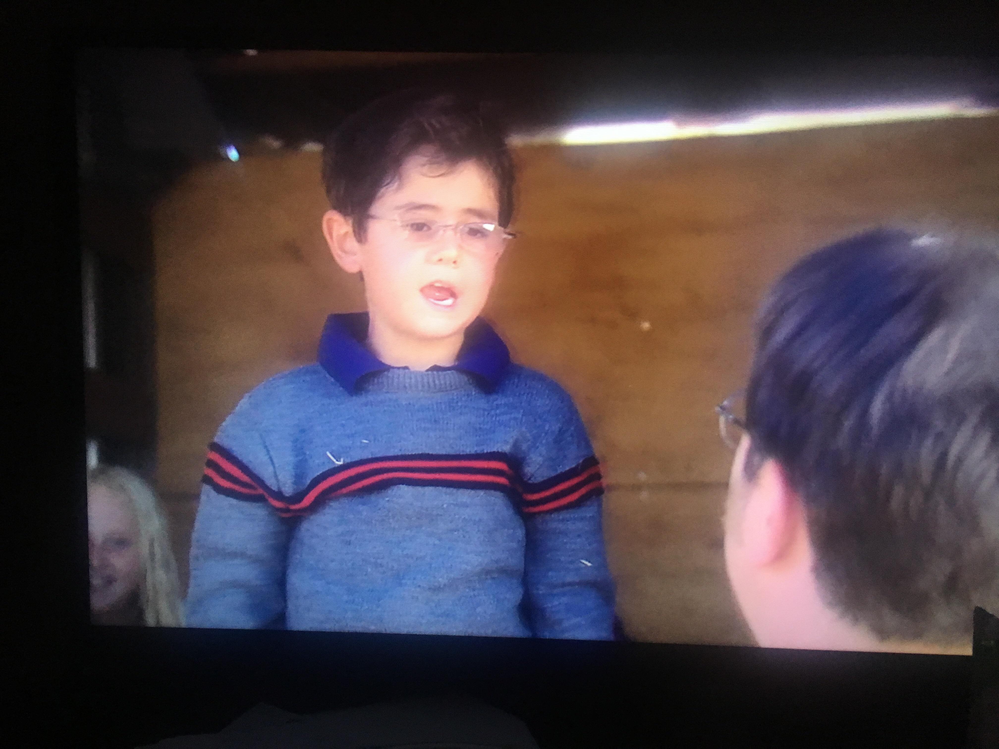 The kid that Dwight picks off of the hay ride is his nephew (from aunt