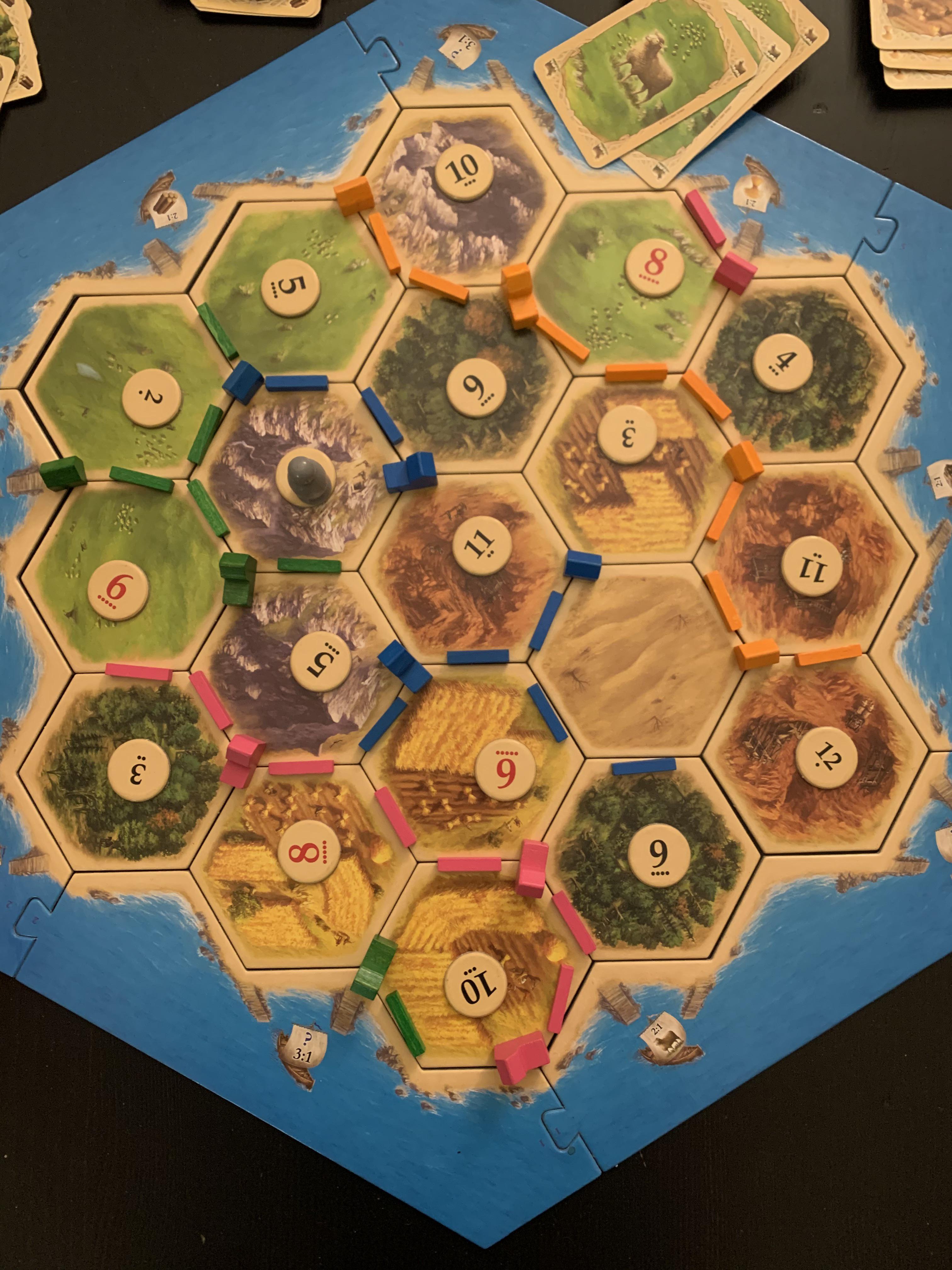 Green won (+3 victory point dev cards). Unreal. Brick was a myth the entire game. Catan