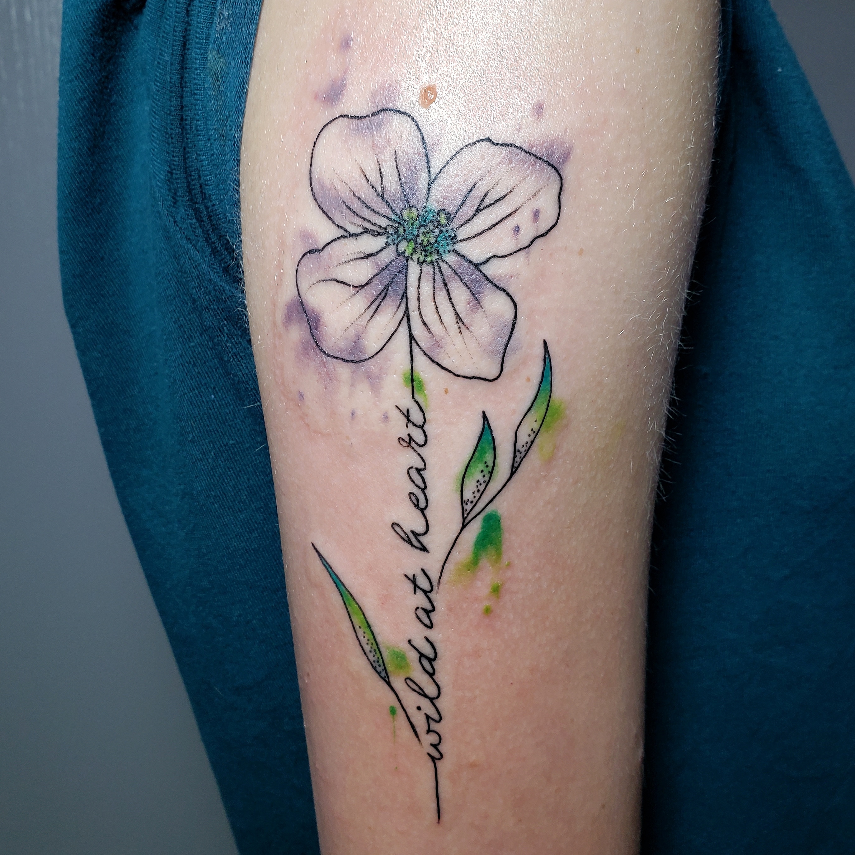 Her very first tattoo for her birthday. A May Flower done in May. Done