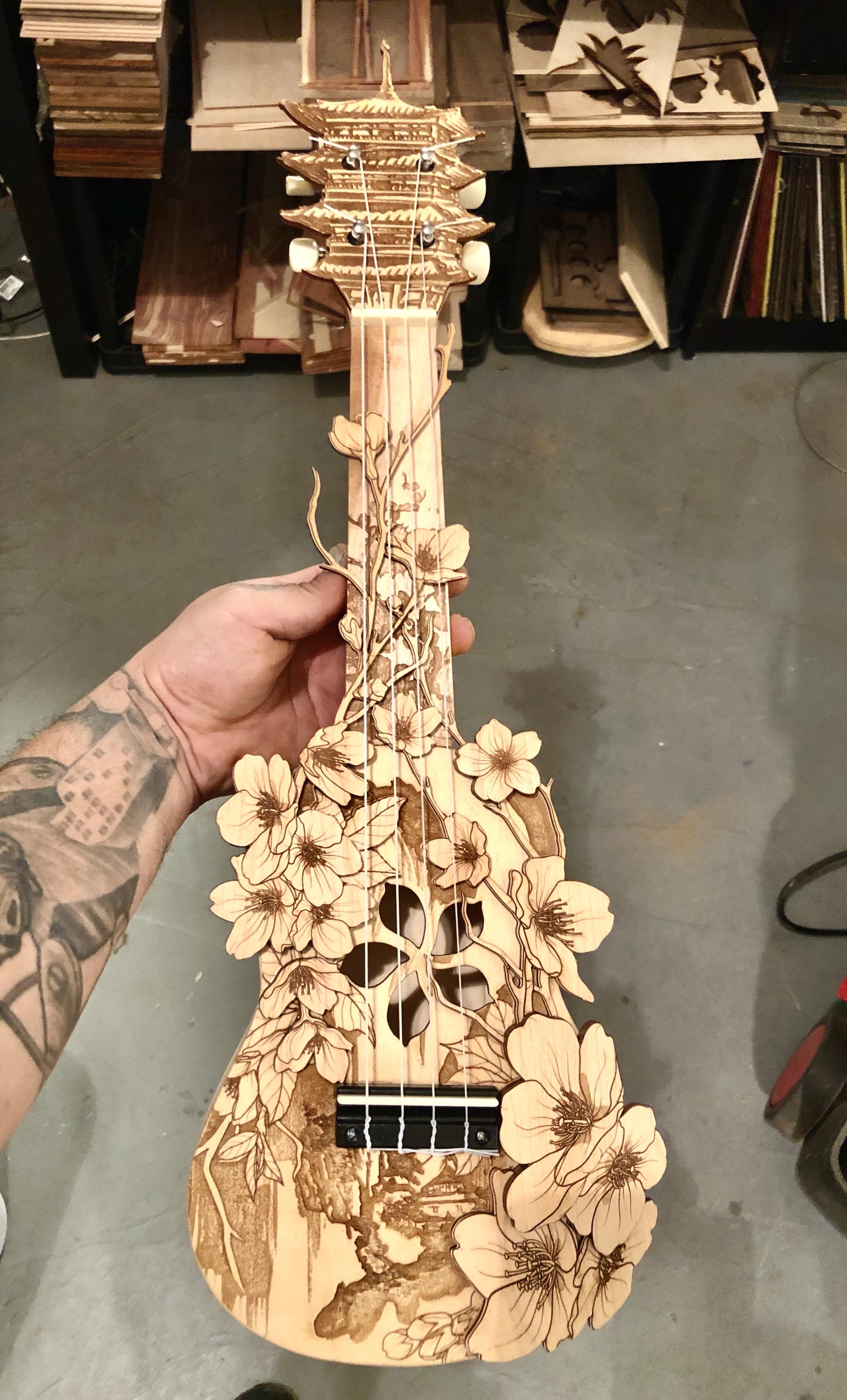 Last year you all loved my laser art ukulele! Here is my newest, with a
