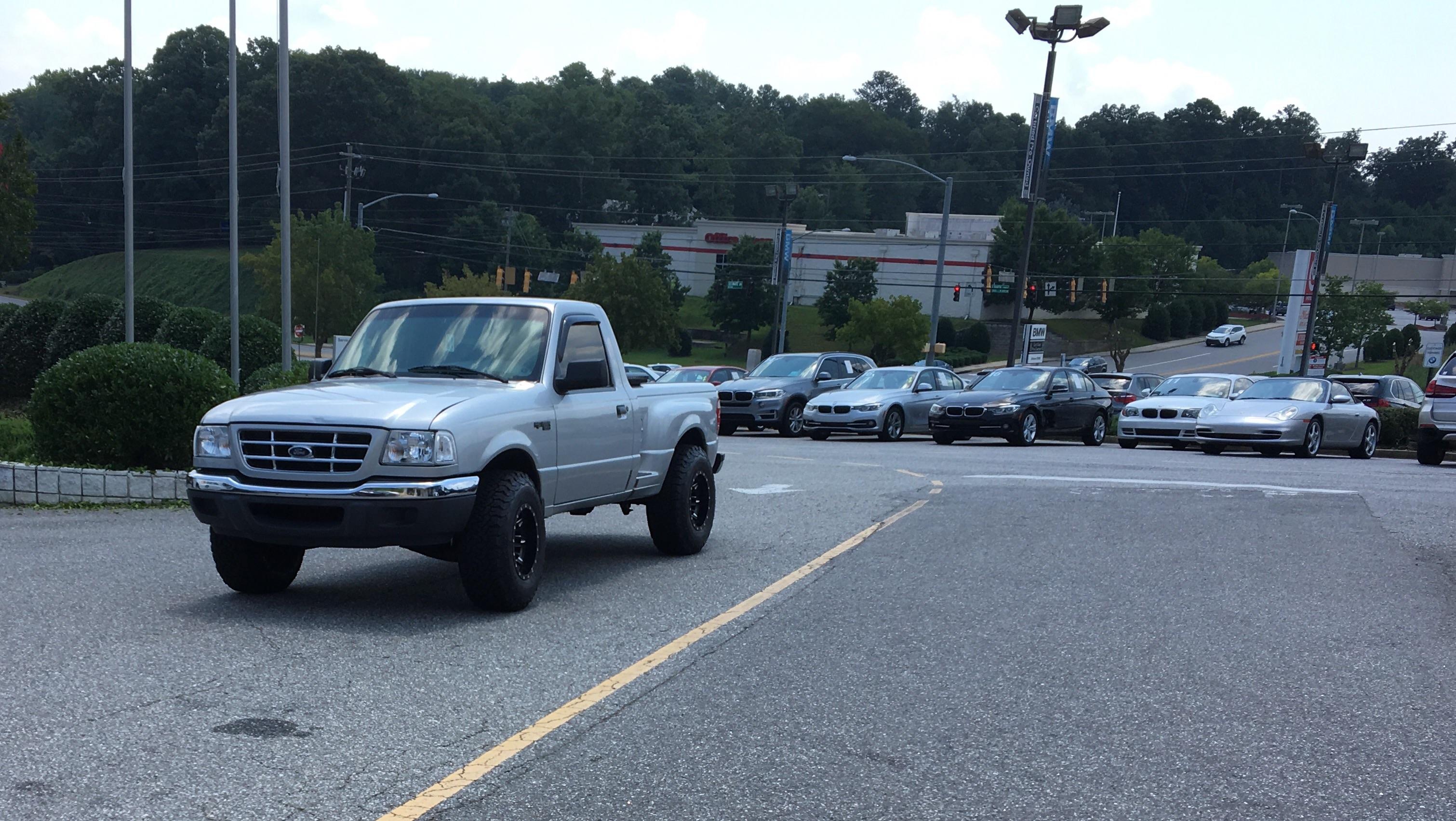 "An American surrounded by Germans" 1944 Colorized. Trucks