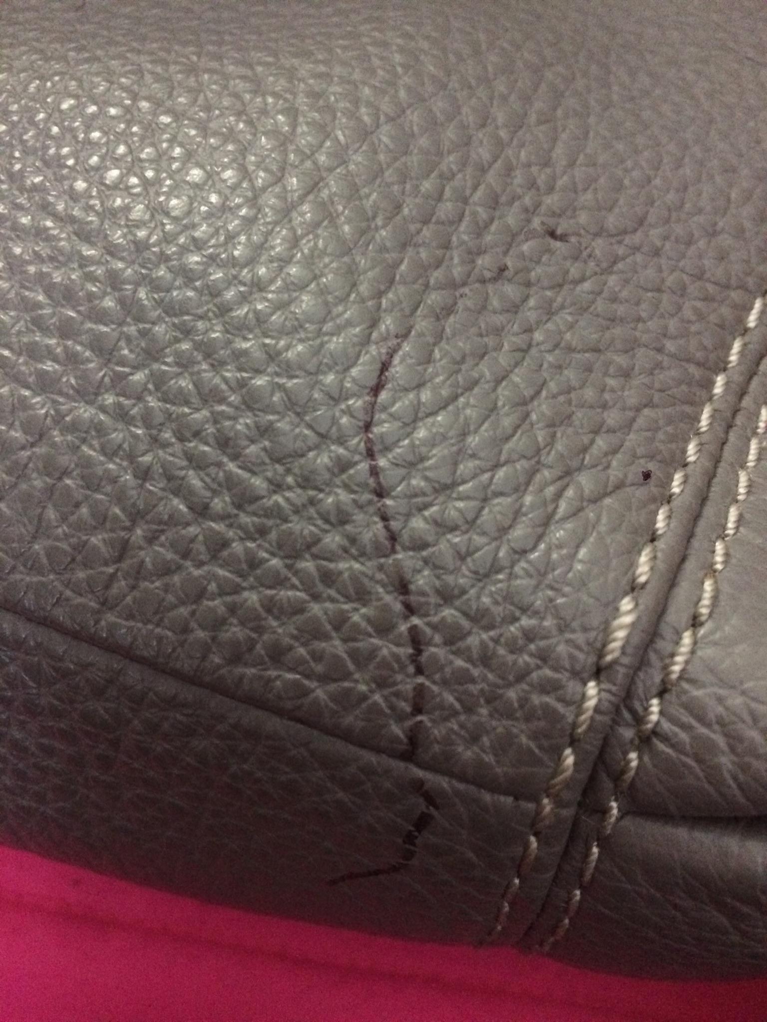 Need your wisdom, how can I get pen ink out of a pebbled leather