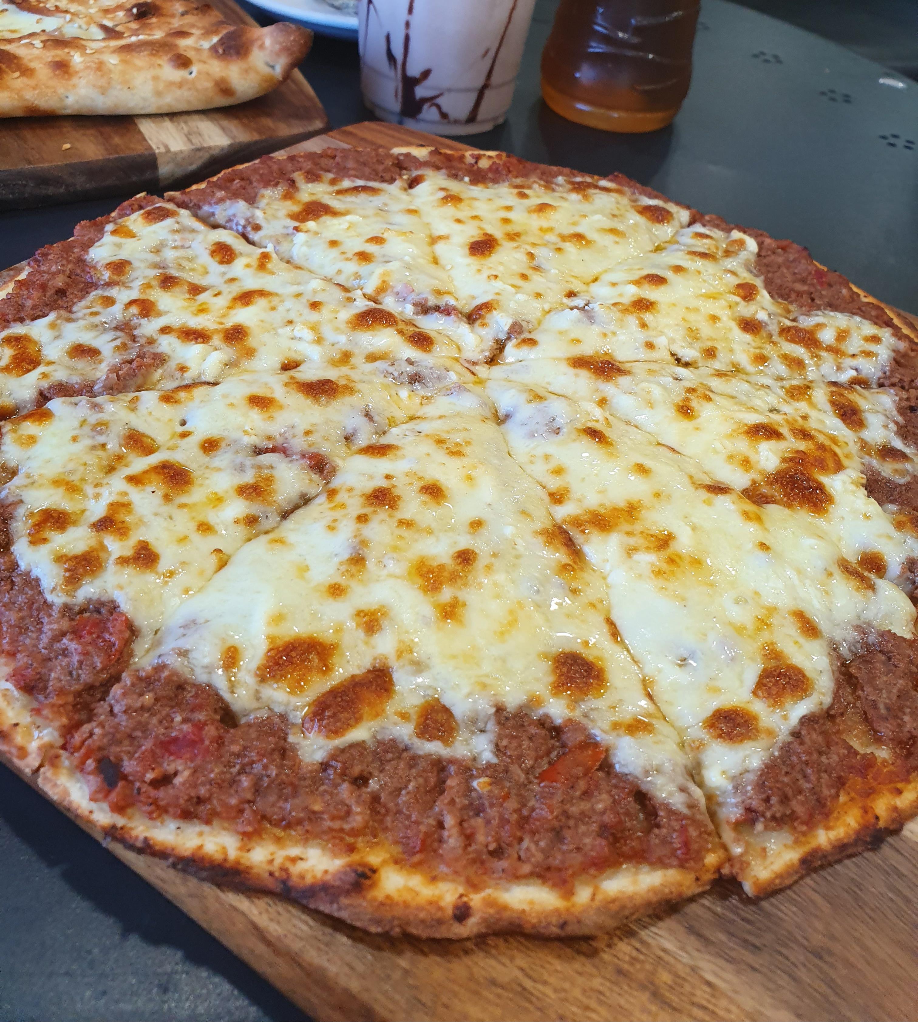 This meat and cheese Manoosh is seriously delicious! r/FoodPorn