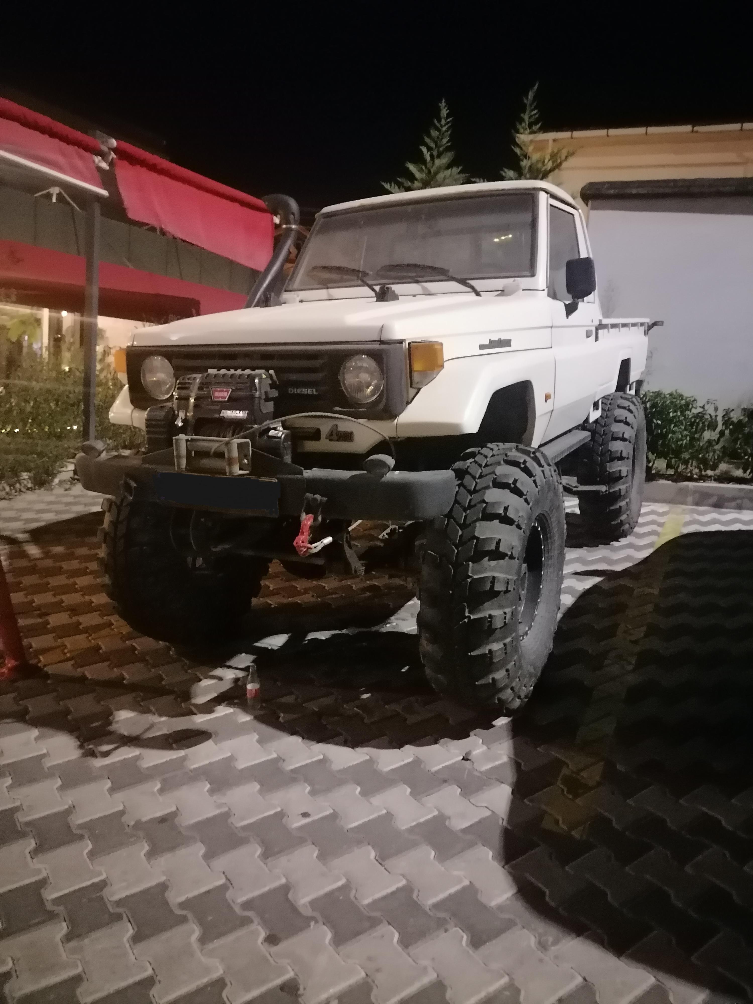 This lifted [Toyota LandCruiser] I saw. That's the coolest car I saw
